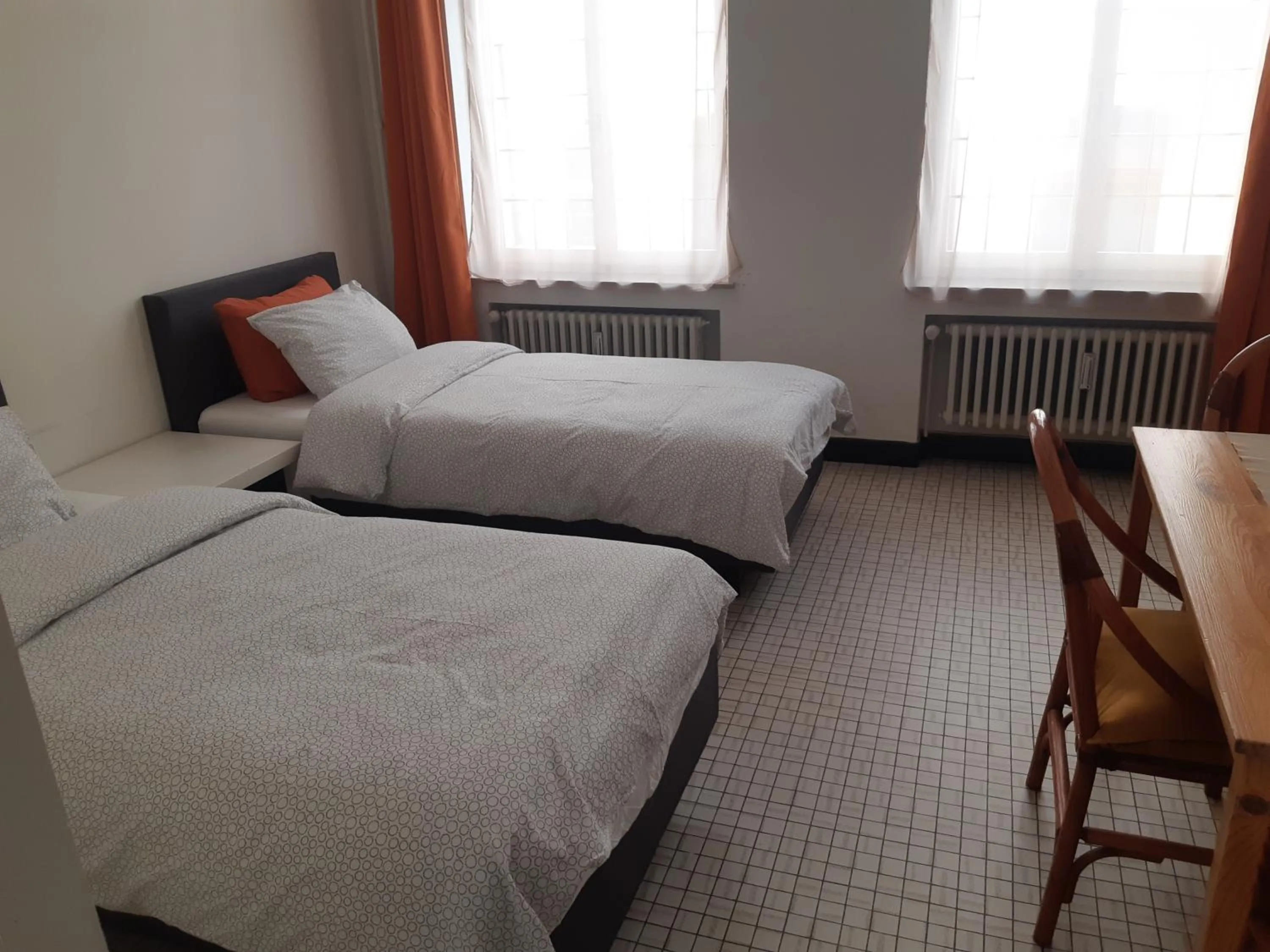 Bed in Rentbynight Aparthotel