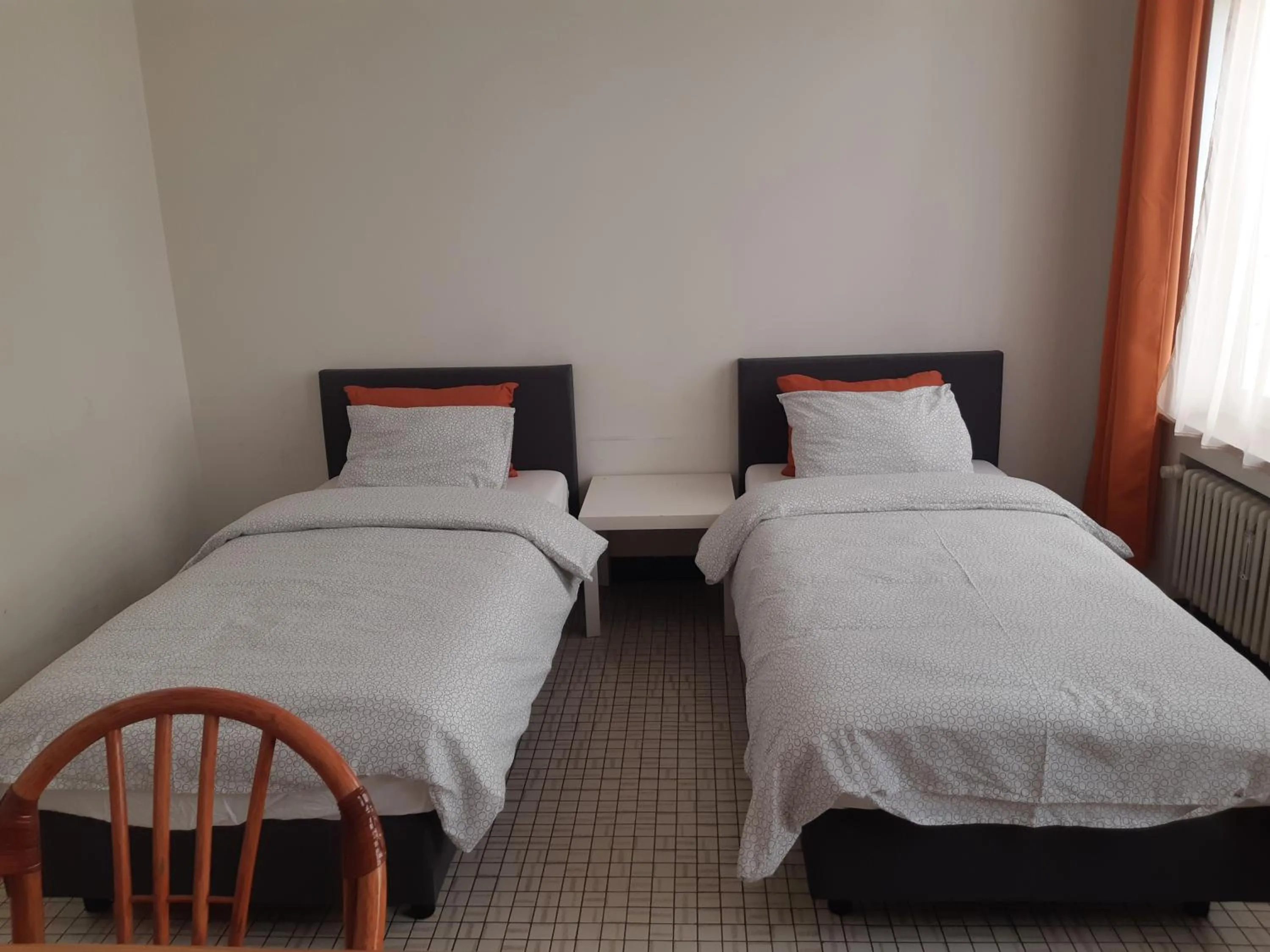 Bed in Rentbynight Aparthotel