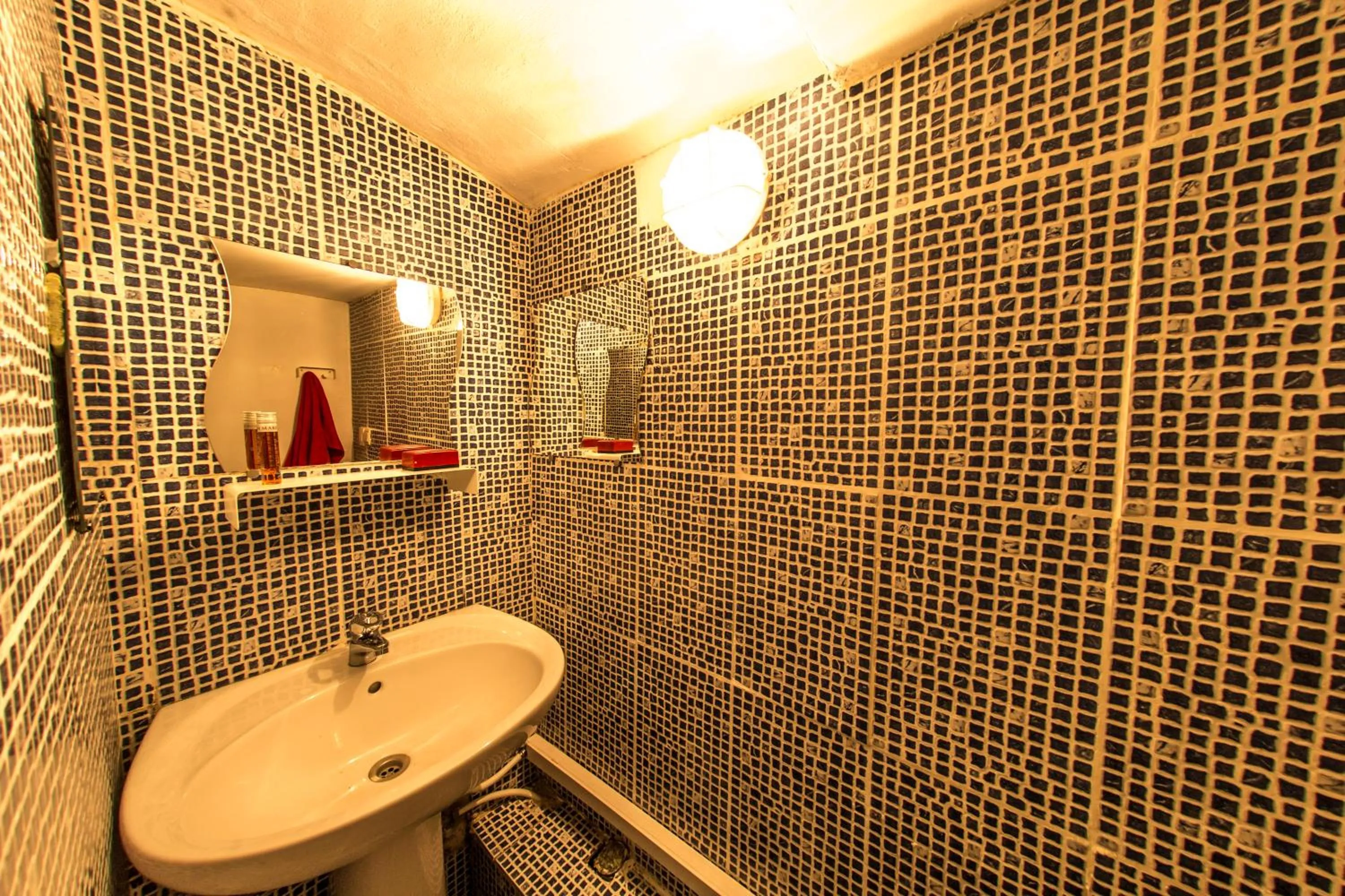 Bathroom in Rentbynight Aparthotel