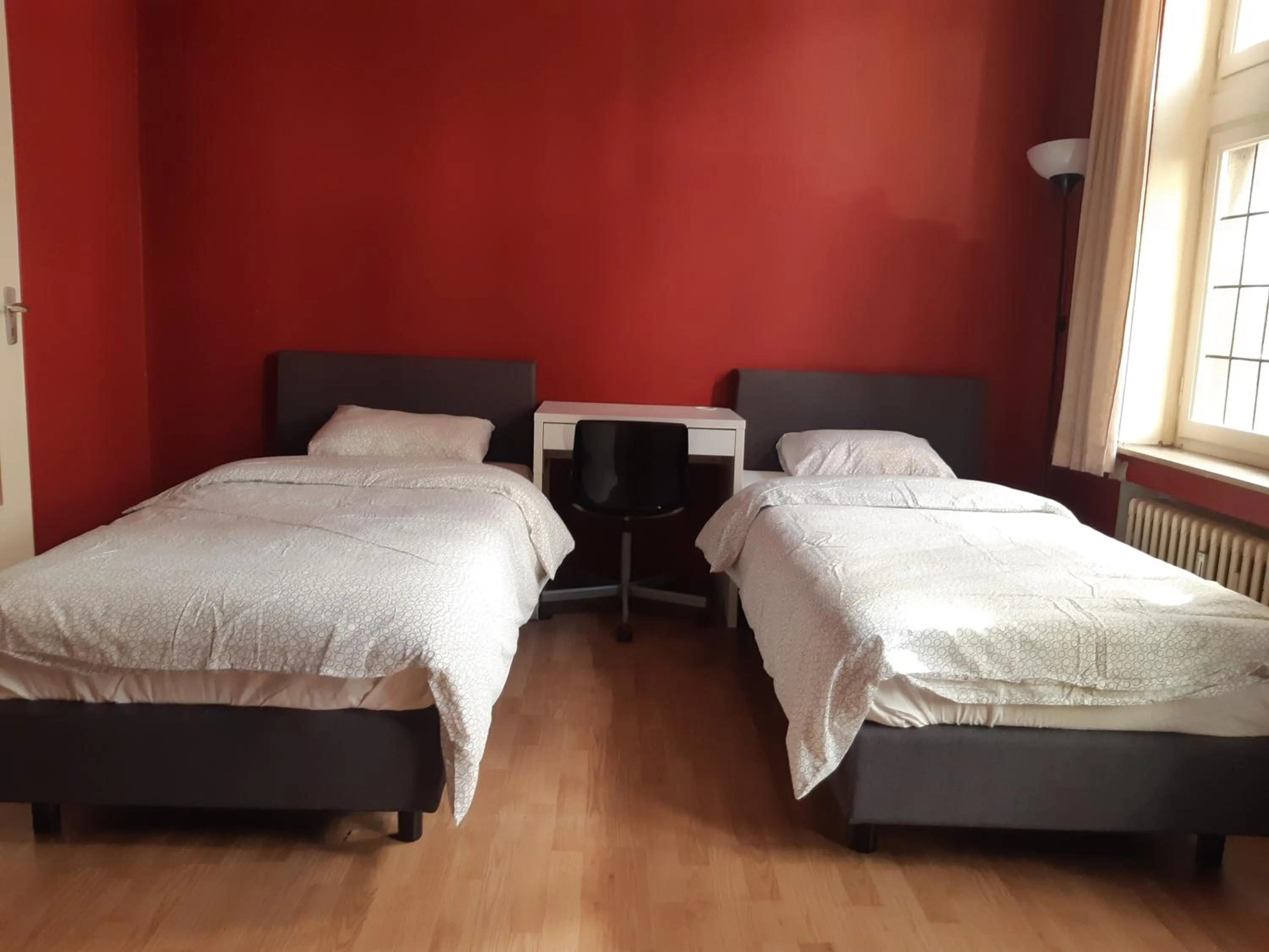 Bed in Rentbynight Aparthotel