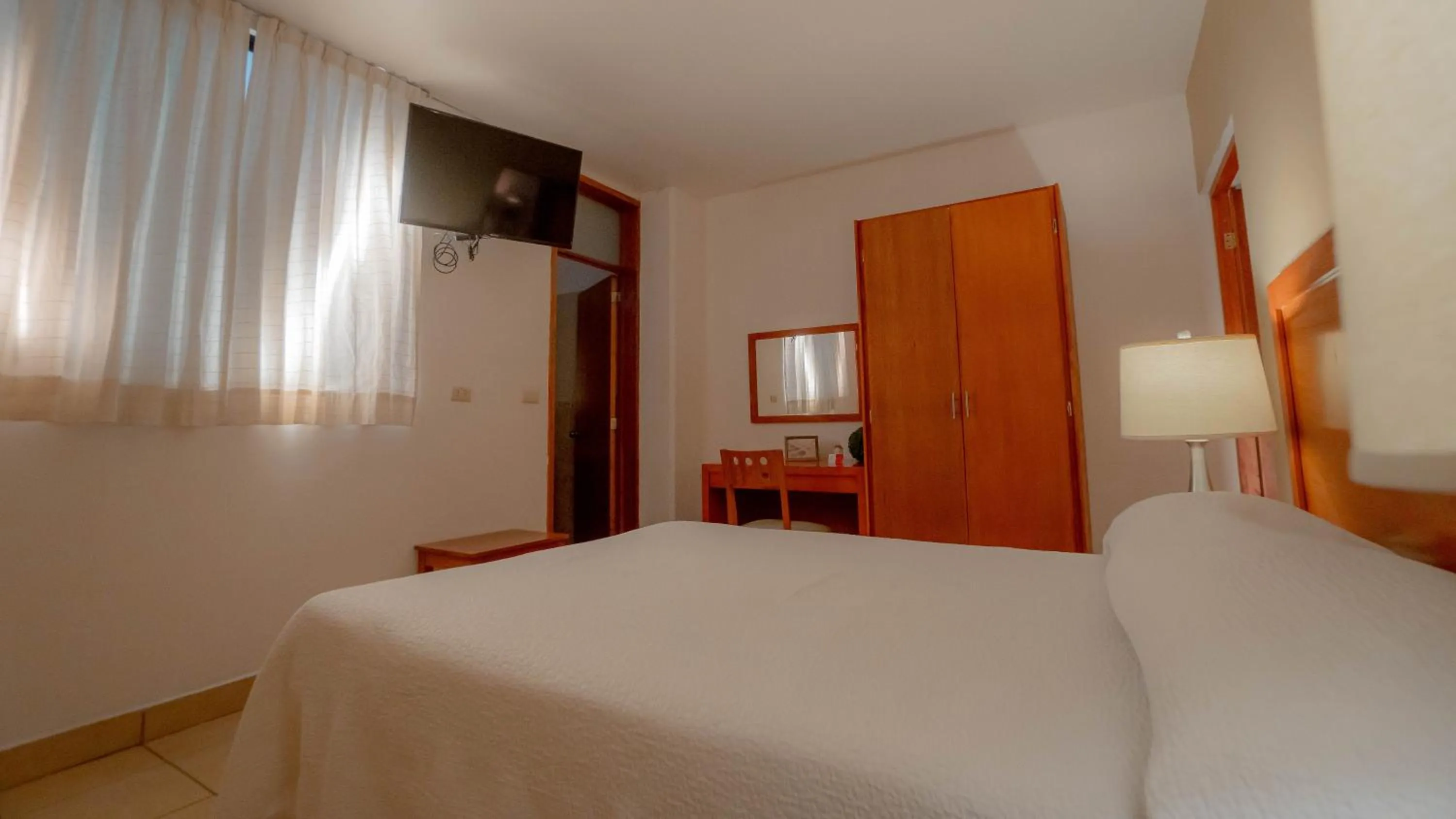 Bed in Hotel Marllou