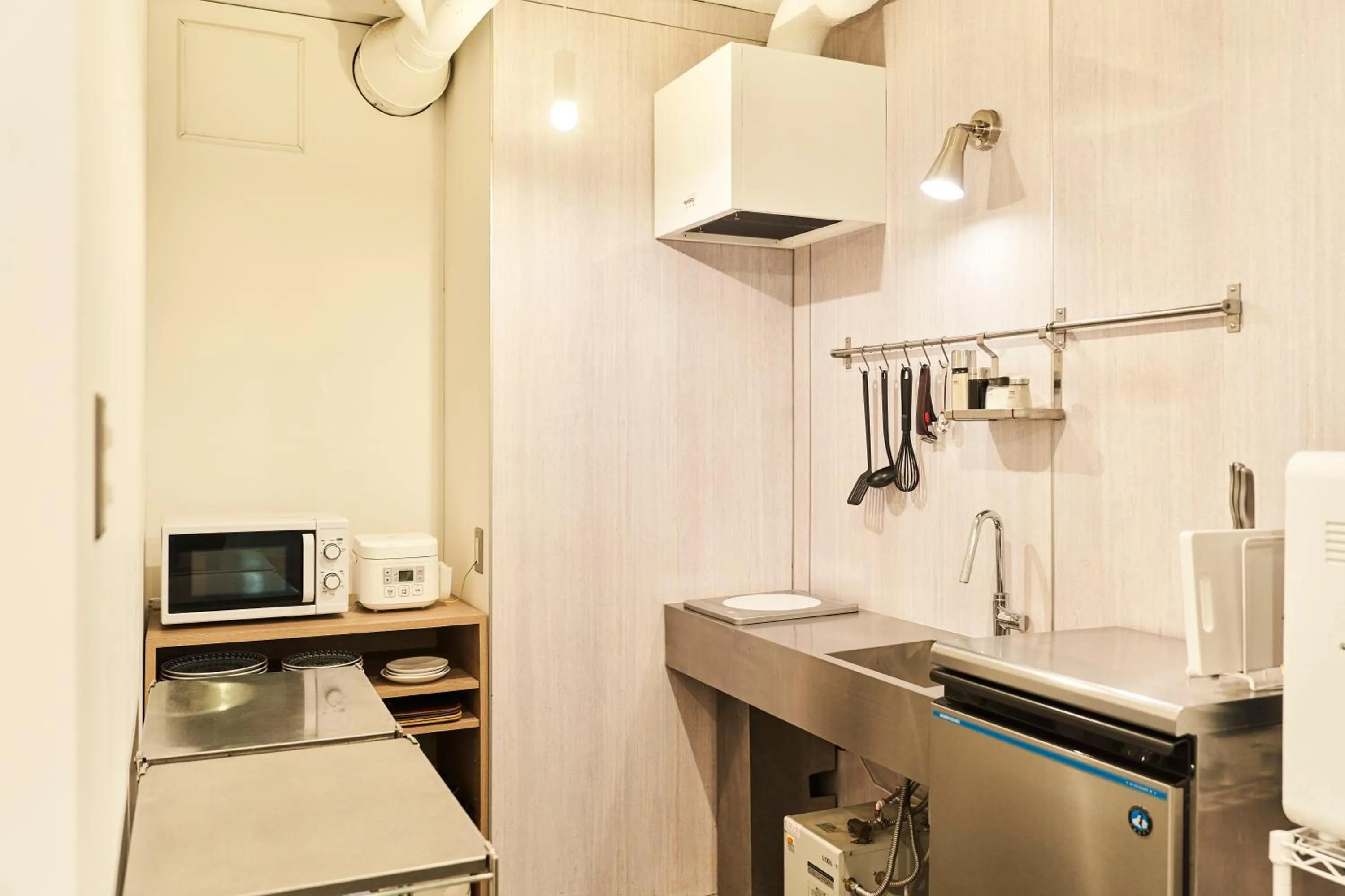 Communal lounge/ TV room in Coco Stay Nishikawaguchi Ekimae