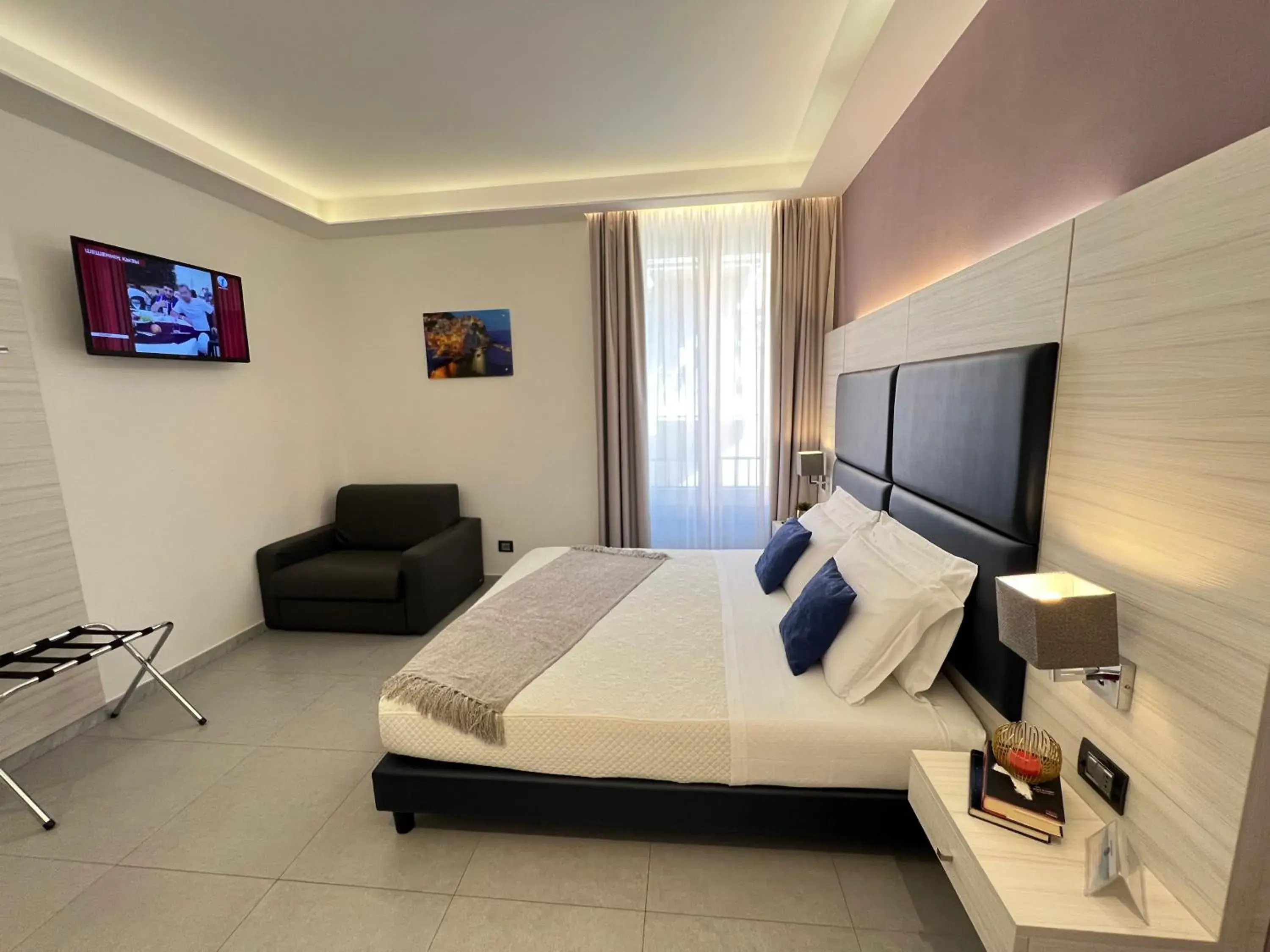 Deluxe Triple Room in Cinqueterre Behind Deluxe Triple Room in Cinqueterre Behind