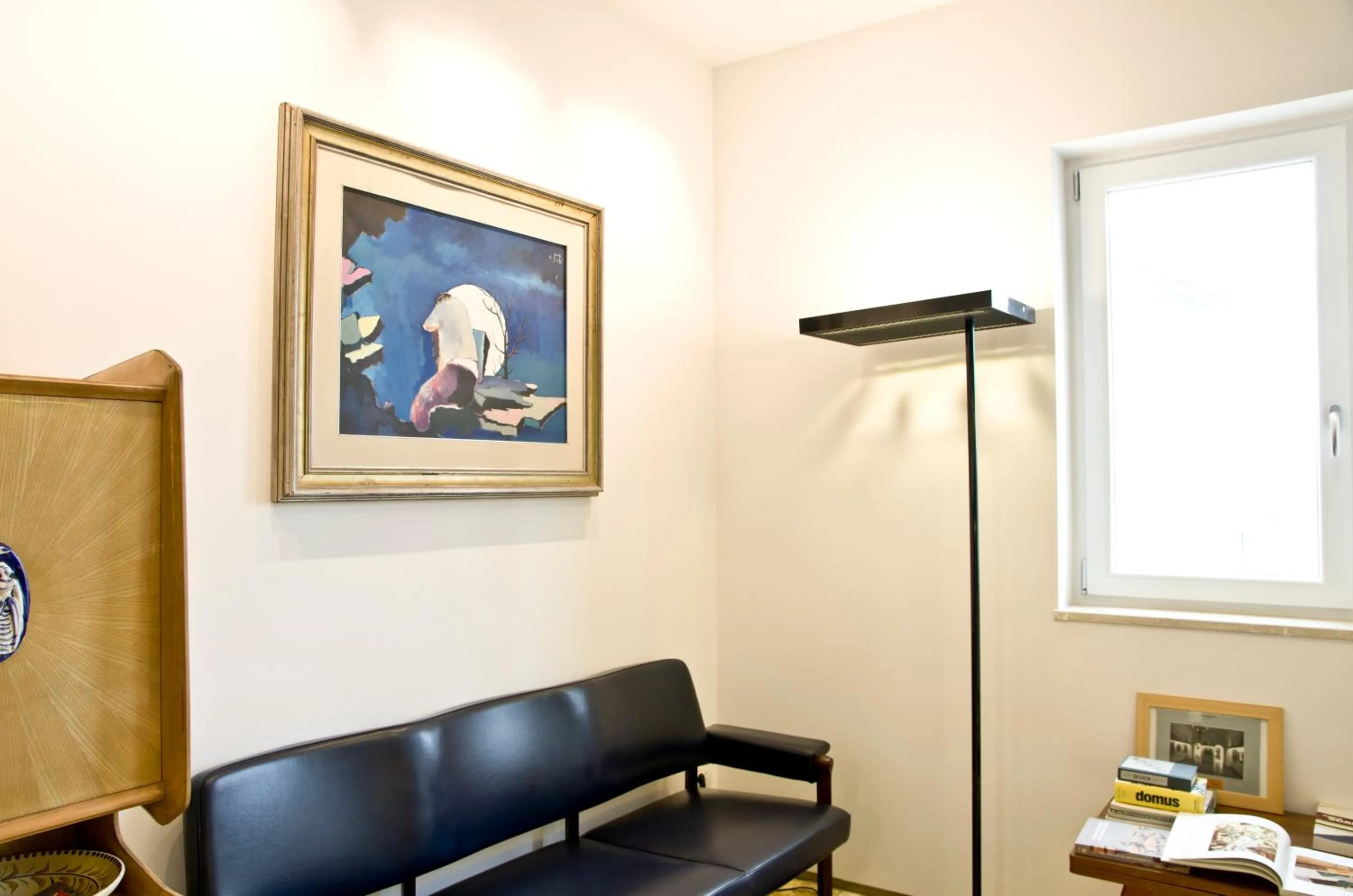 Communal lounge/ TV room in Limen Matera Guesthouse