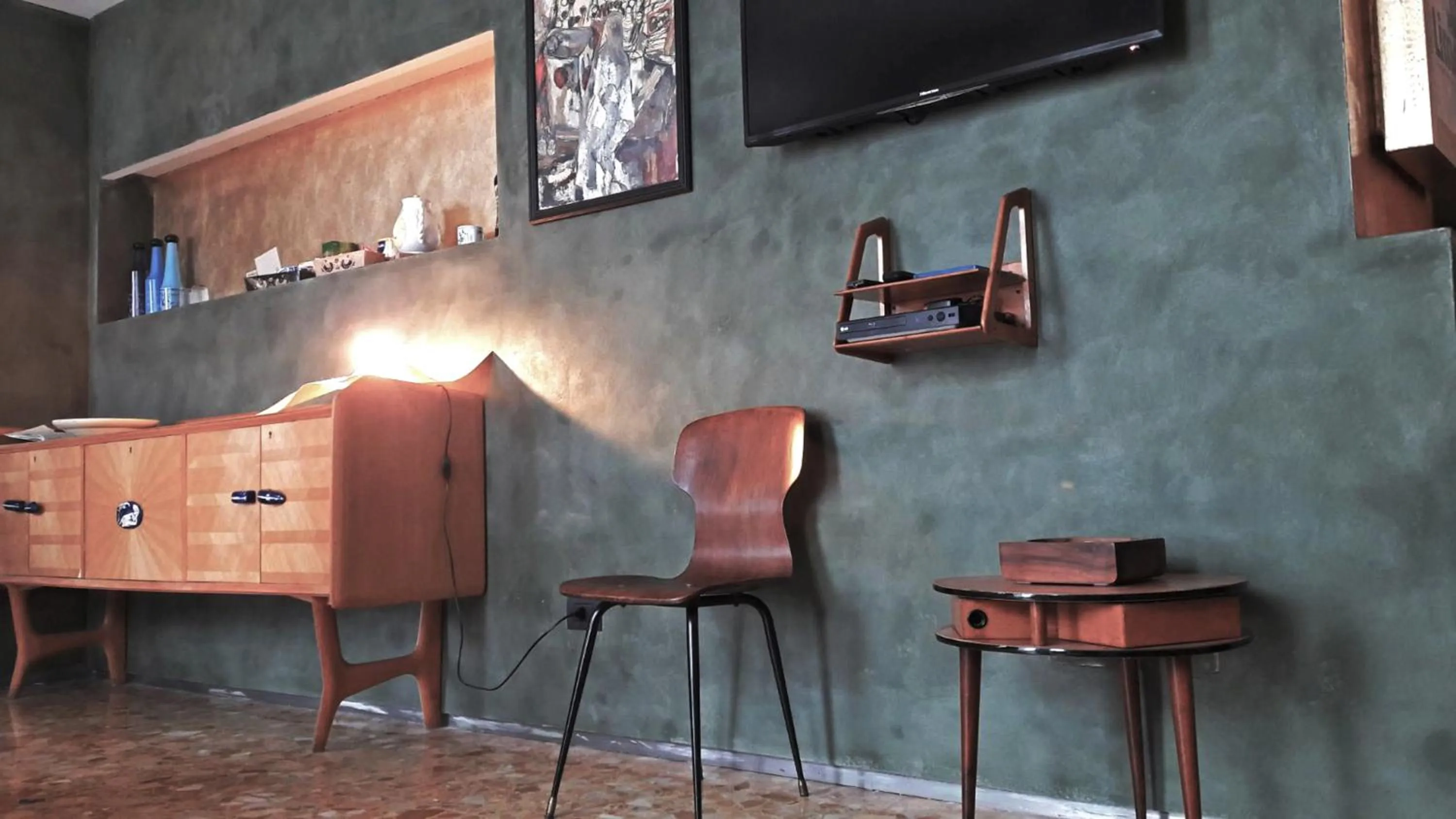 Communal lounge/ TV room in Limen Matera Guesthouse