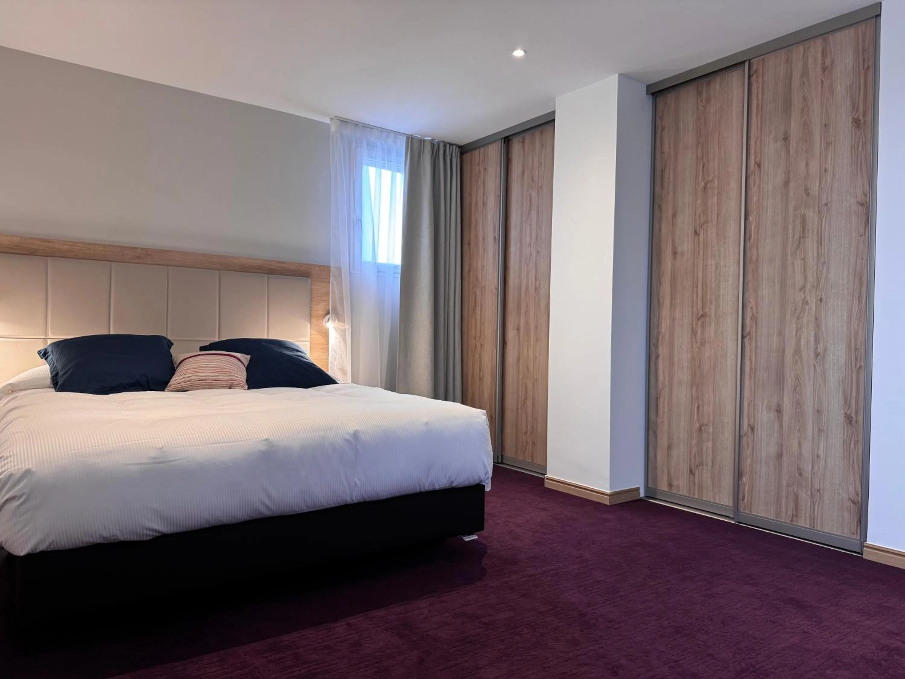 Bedroom, Bed in Brit Hotel de Grignan Vichy