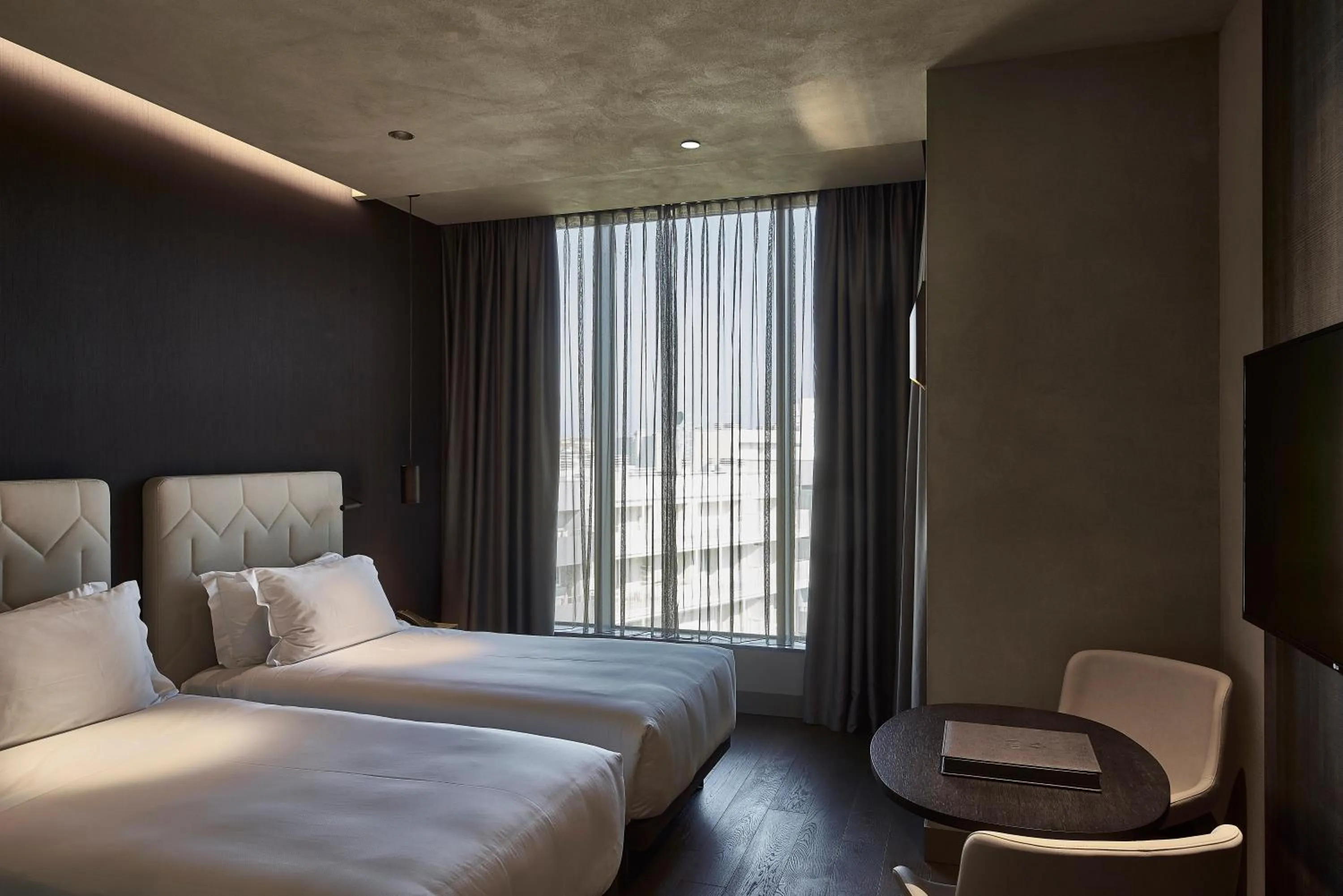 Bed in Hotel VIU Milan, a Member of Design Hotels