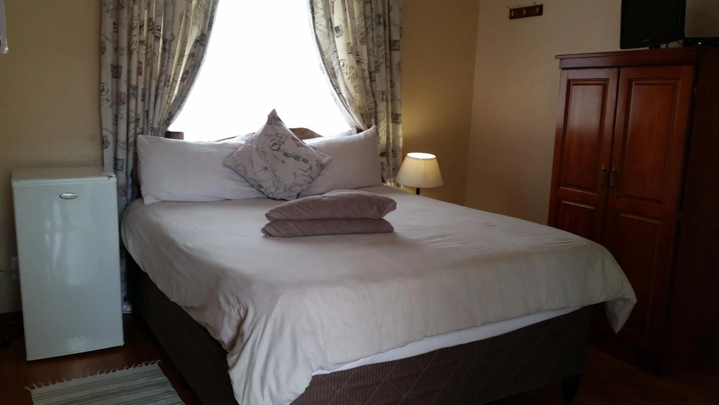 Bed in Kalahari Guest House