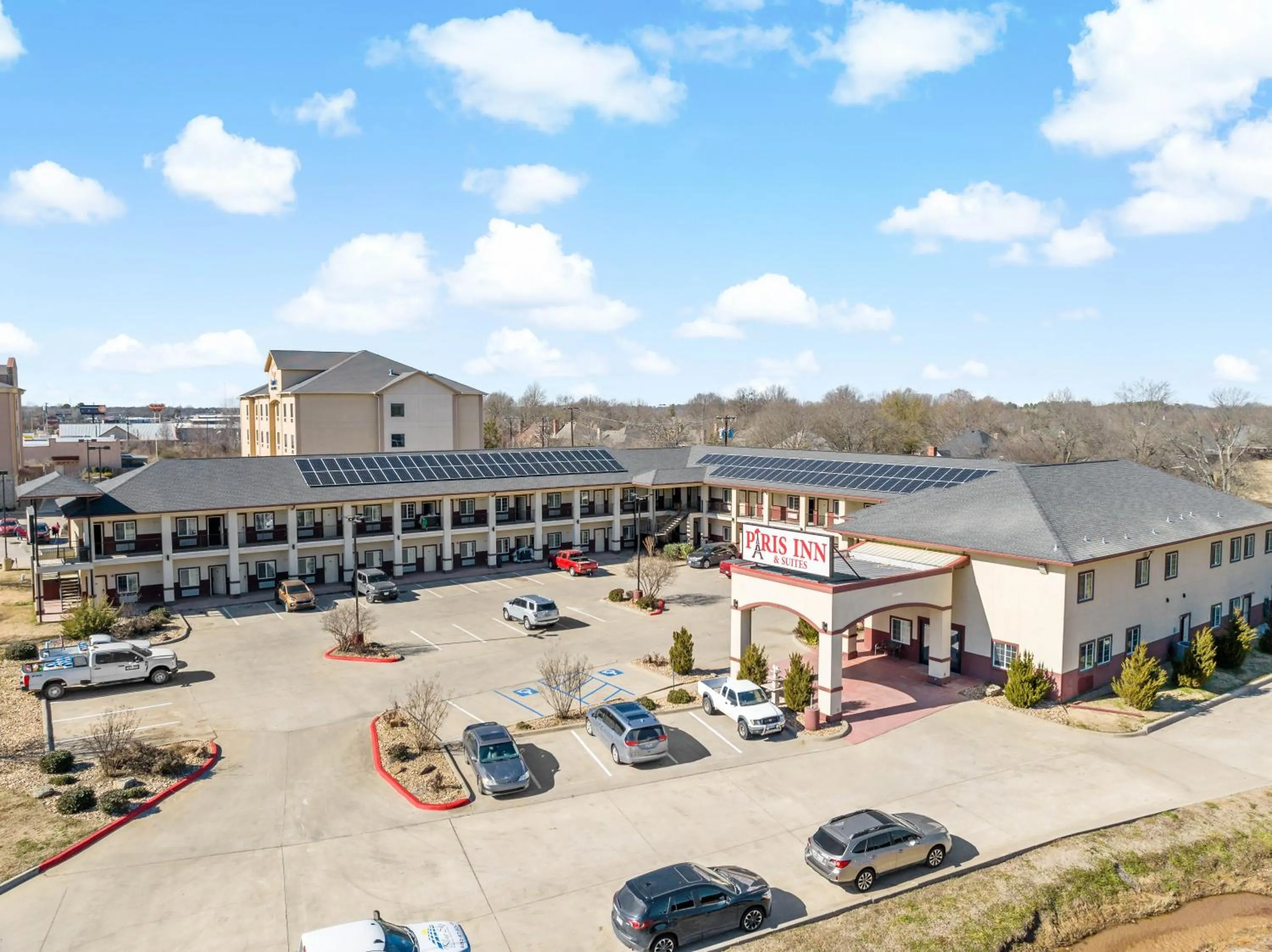 Property building in Paris Inn & Suites