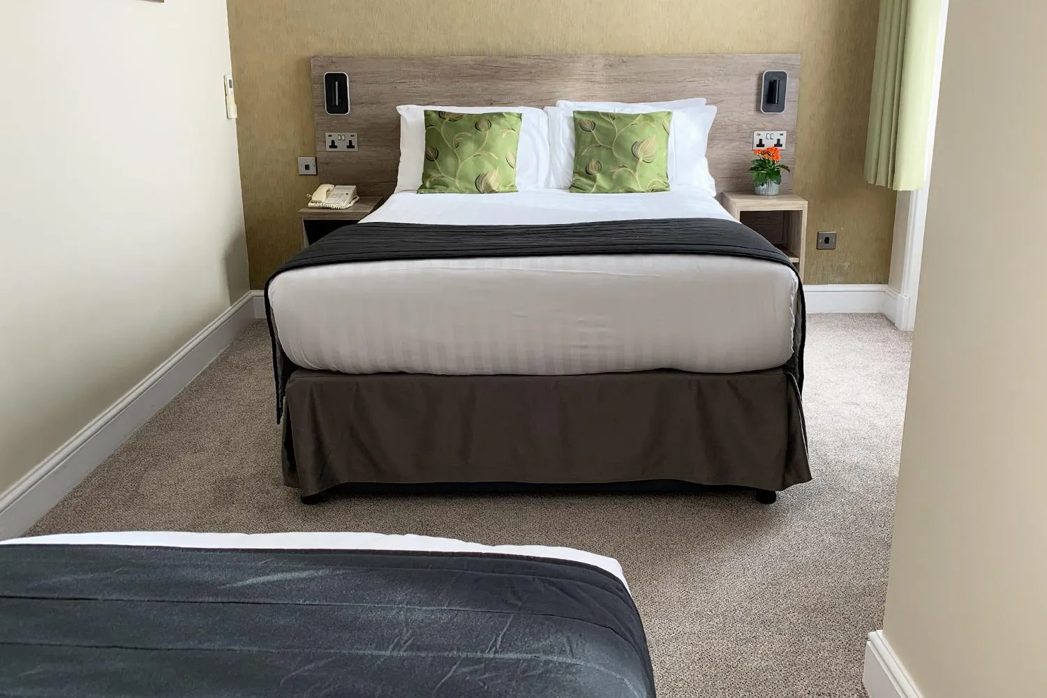 Bed in Kensington Gardens Hotel