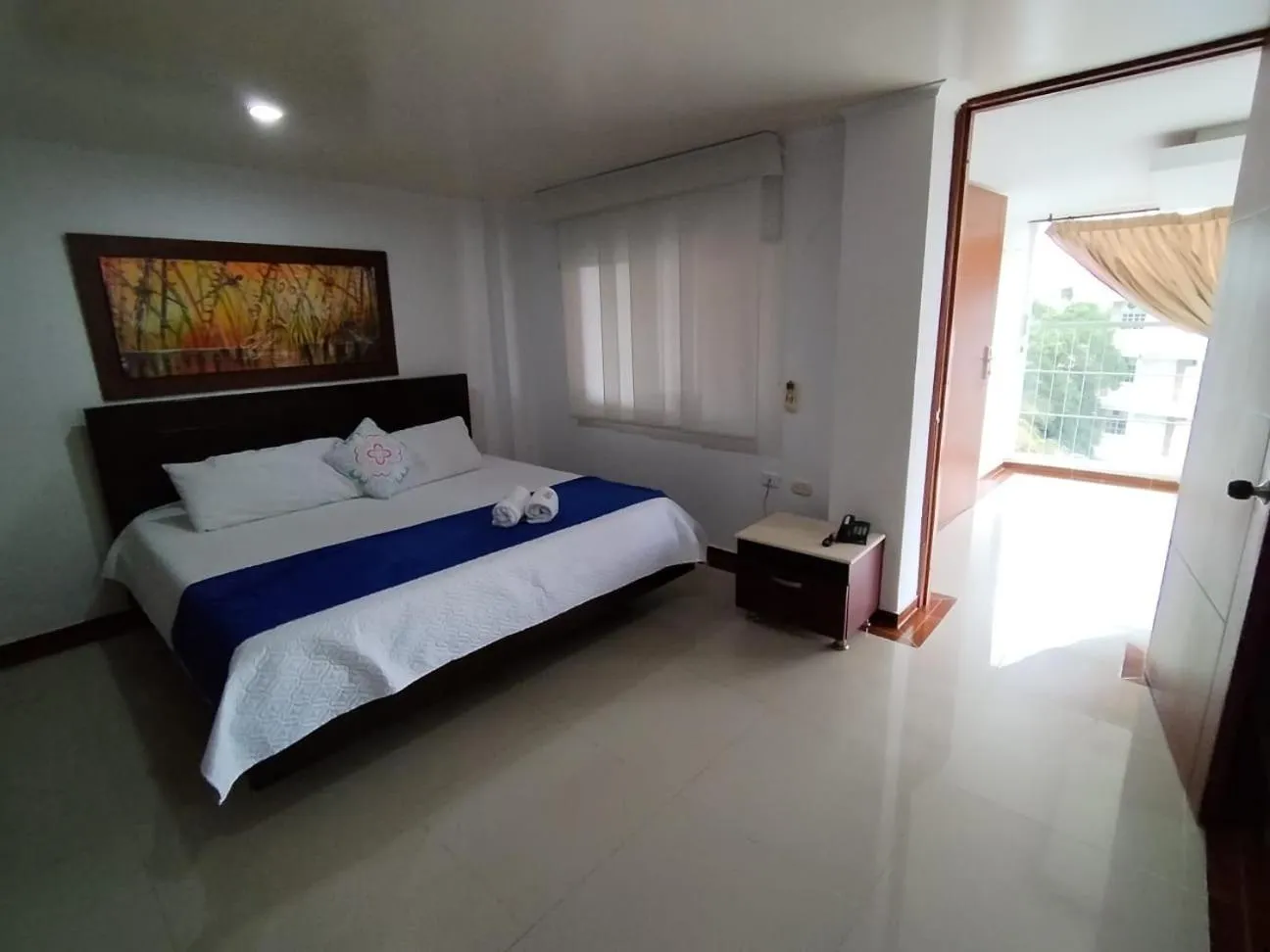 Living room, Bed in Hotel El Bosque Valledupar
