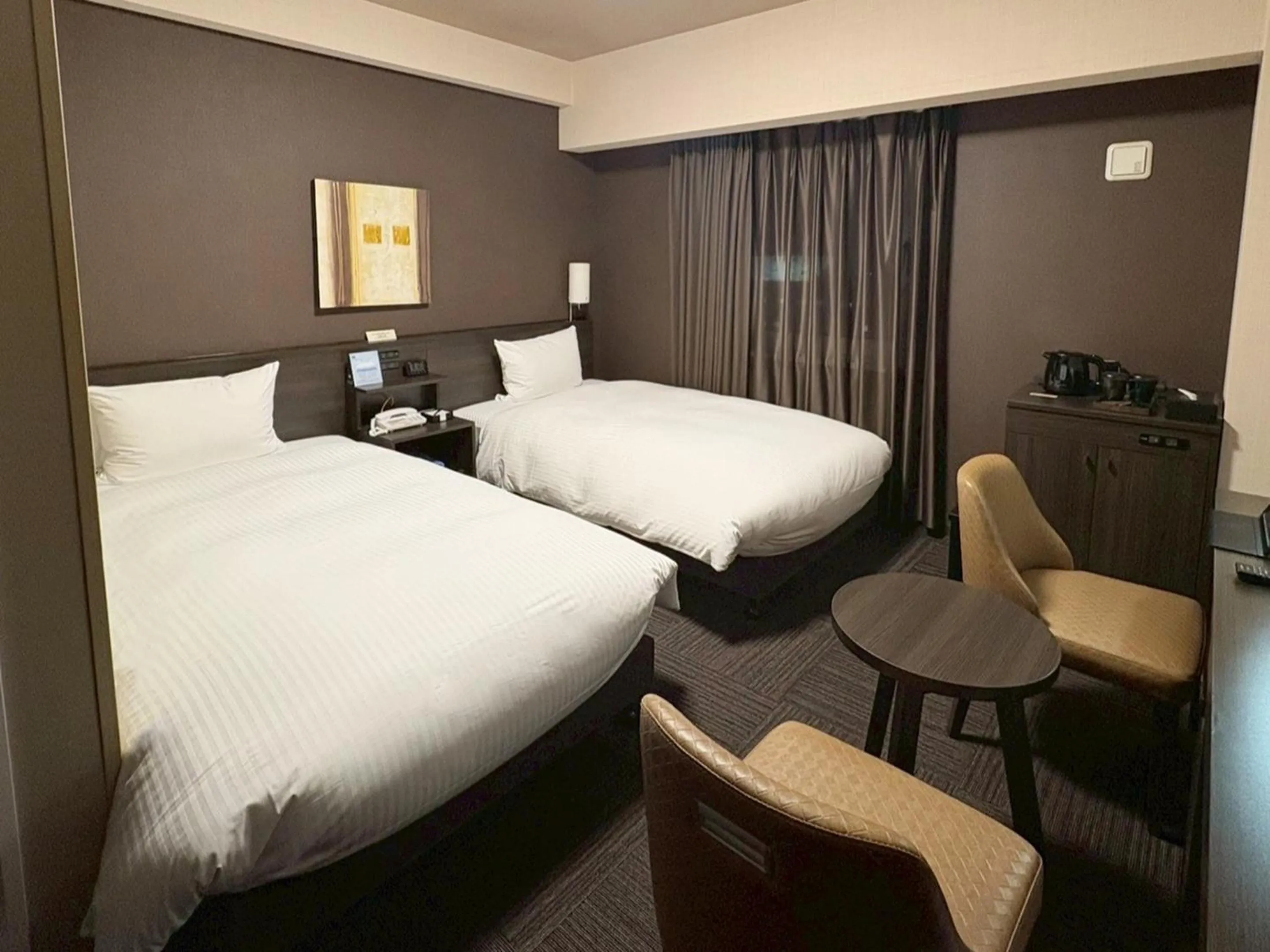 Photo of the whole room, Bed in Hotel Route-Inn Higashihiroshima Saijo Ekimae