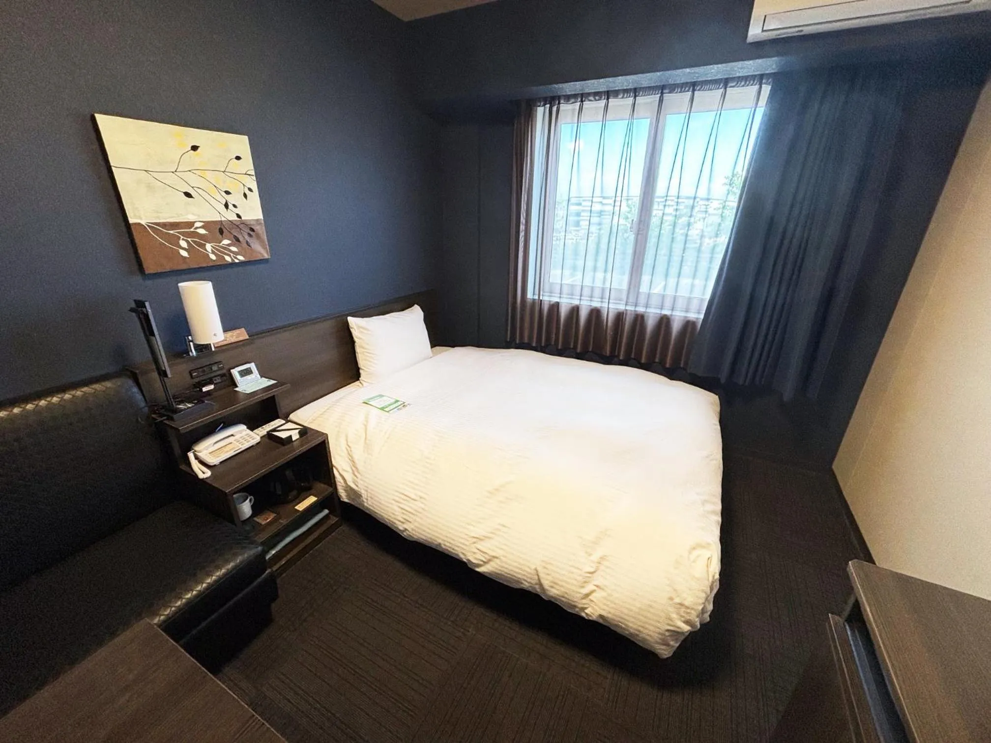 Photo of the whole room, Bed in Hotel Route Inn Osaka Izumi -Kishiwada Izumi Inter-