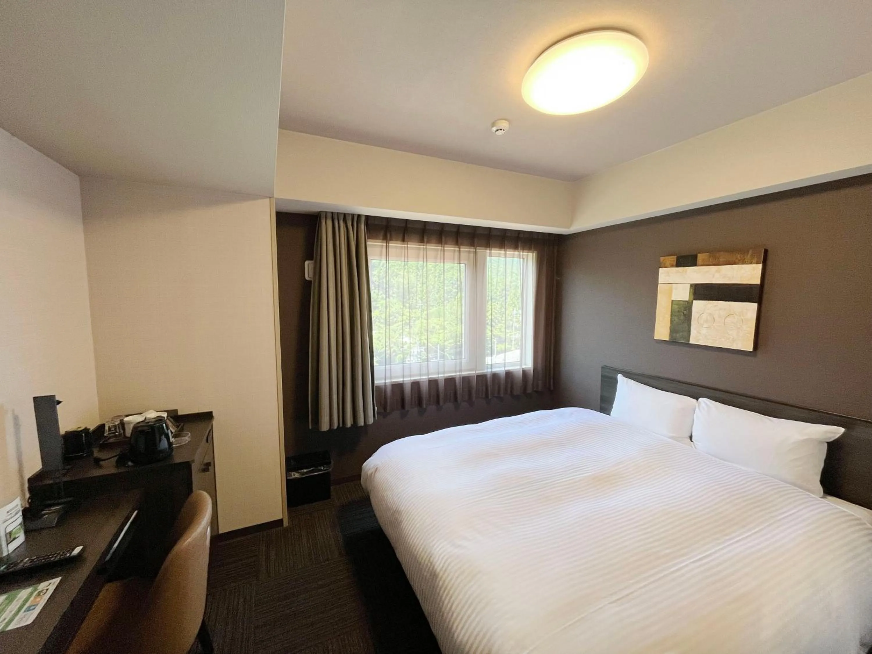 Bedroom, Bed in Hotel Route-Inn Higashiomi Yokaichi Ekimae