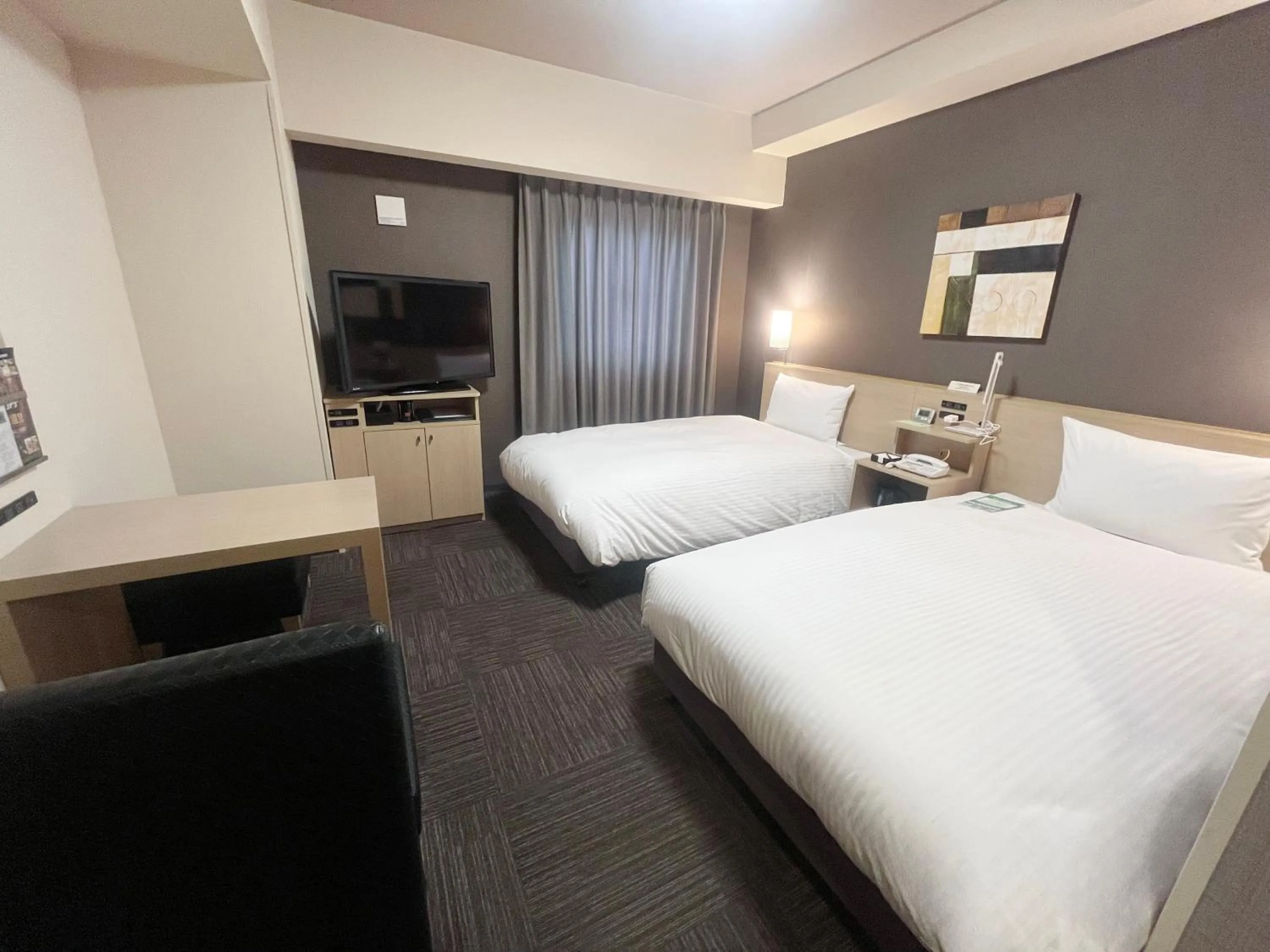 Photo of the whole room, Bed in ​Hotel Route-Inn Ube​