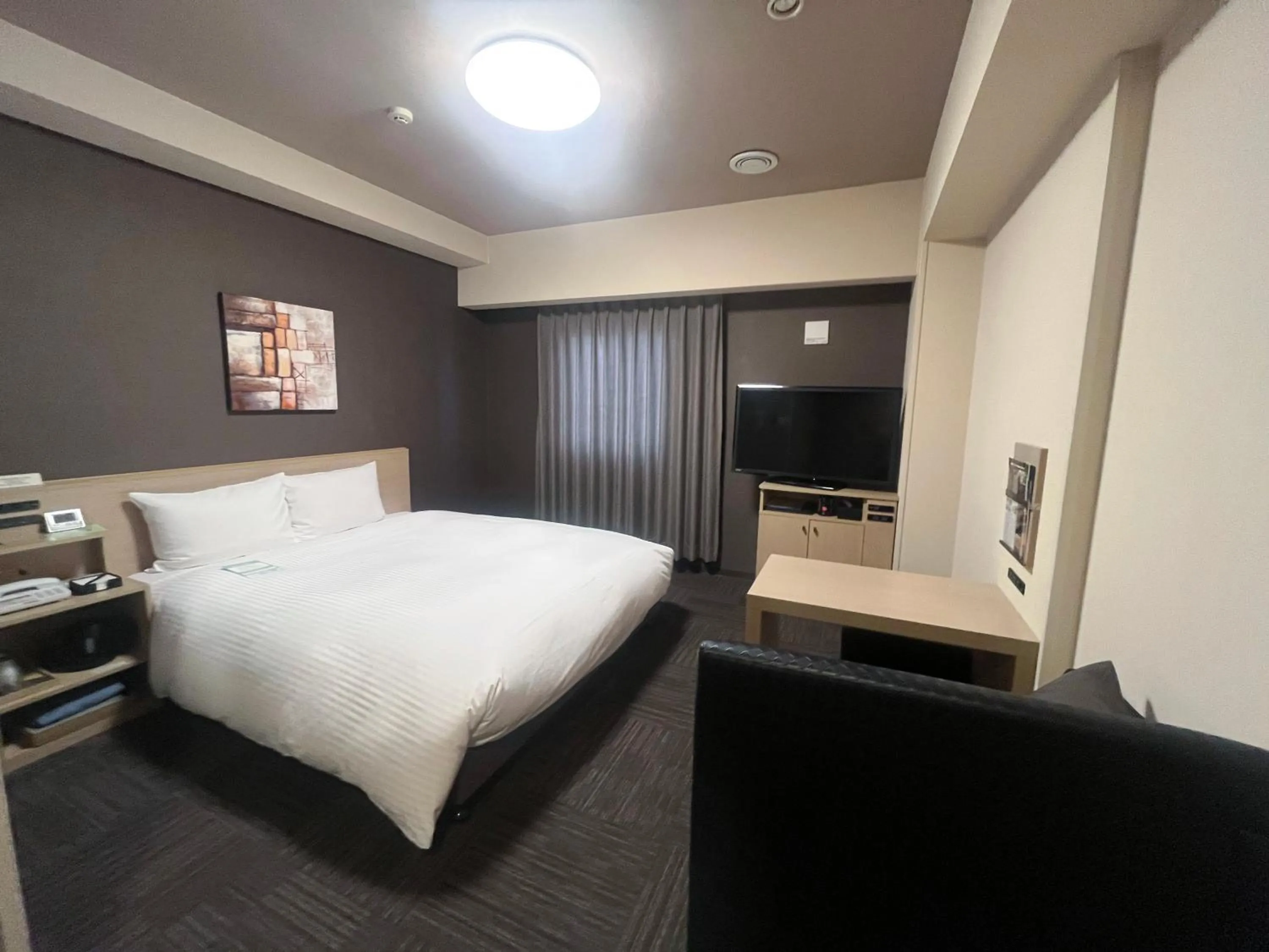 Photo of the whole room, Bed in ​Hotel Route-Inn Ube​