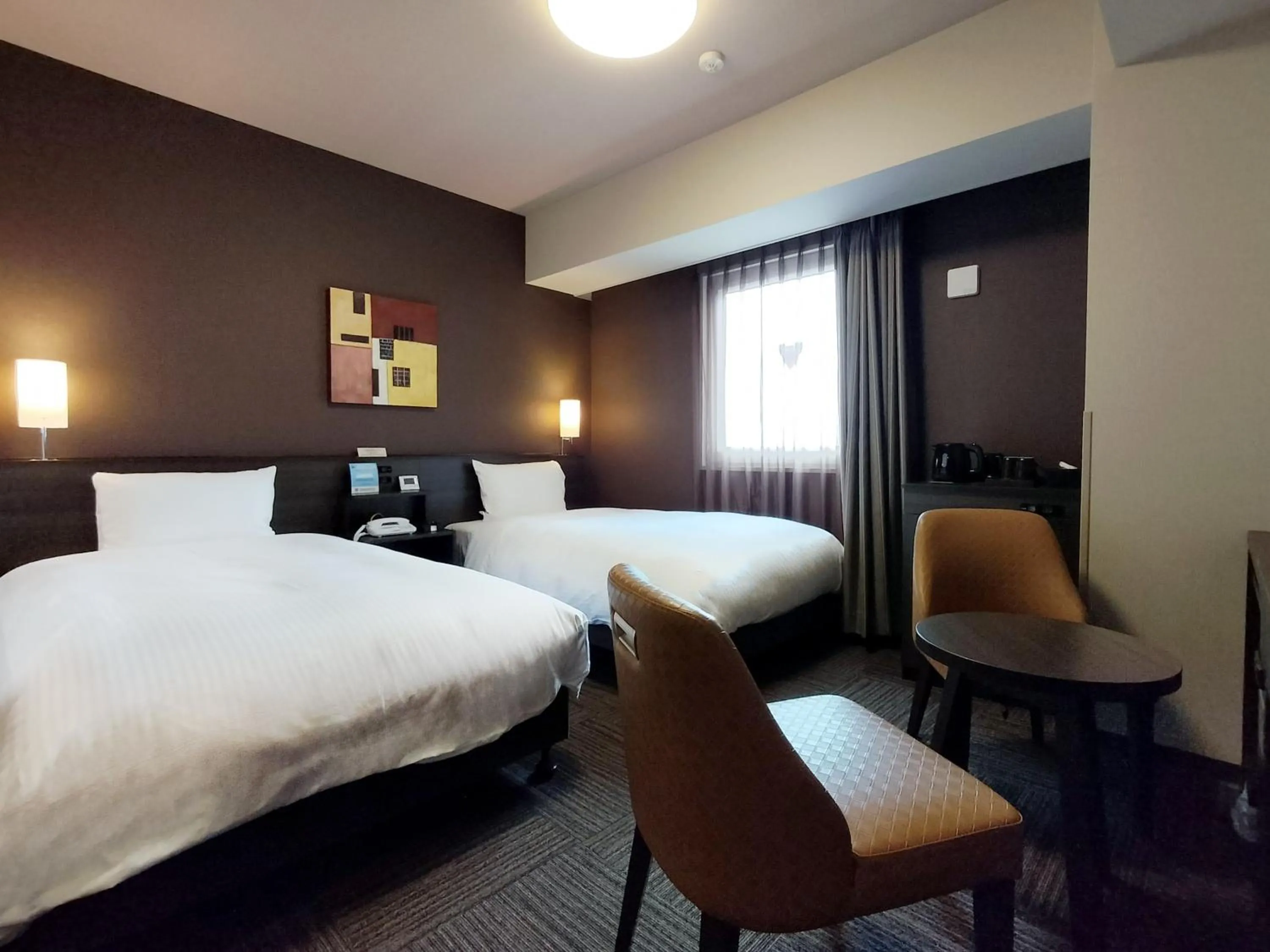 Photo of the whole room, Bed in Hotel Route-Inn Takaoka Ekimae