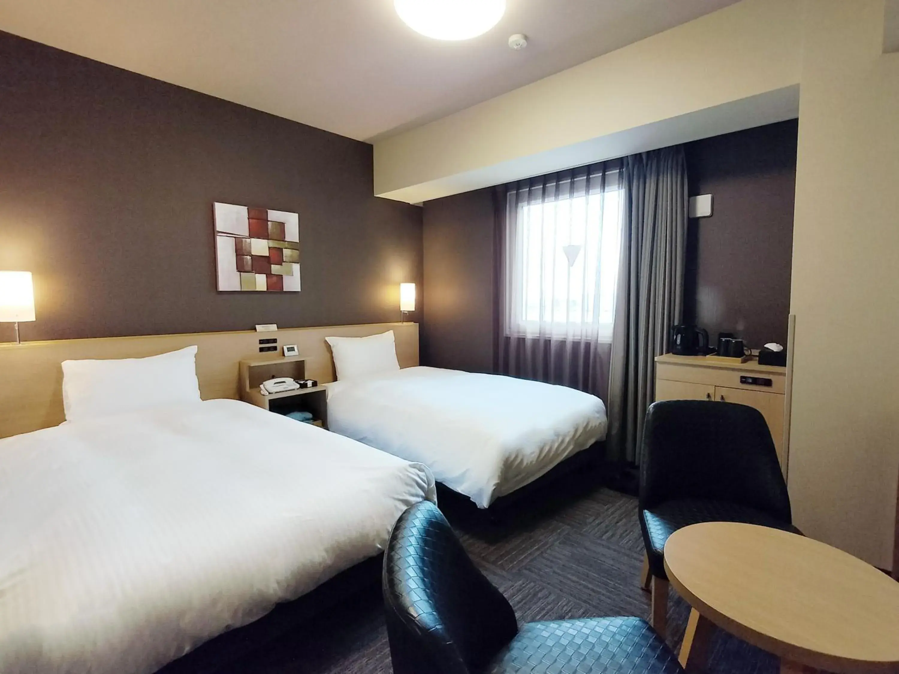 Standard Twin Room - single occupancy - Non-Smoking in Hotel Route-Inn Takaoka Ekimae Standard Twin Room - single occupancy - Non-Smoking in Hotel Route-Inn Takaoka Ekimae