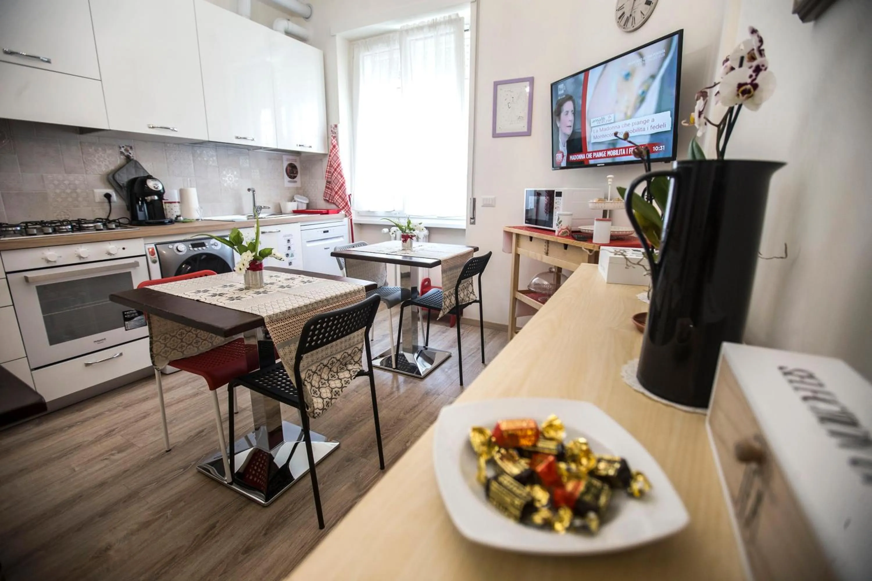Communal lounge/ TV room in A Casa di Benny