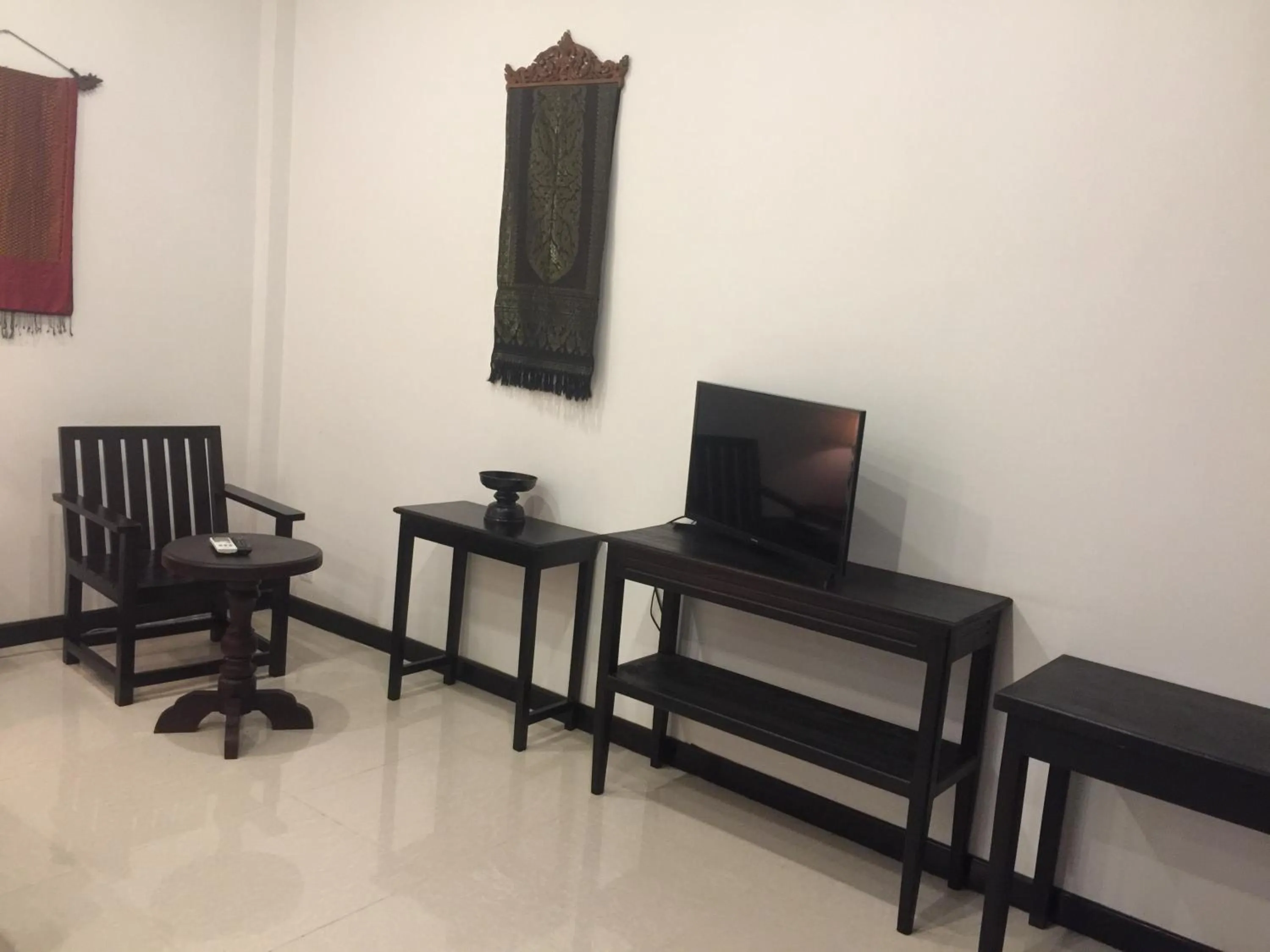 Communal lounge/ TV room in Private Boutique Home with Pool, The Fin Angkor Boutique