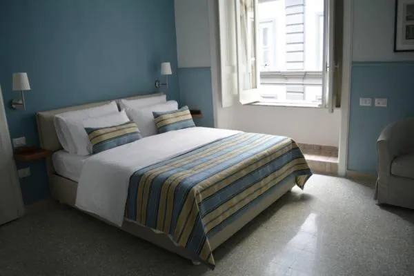 Bed in Aragonese Luxury Rooms