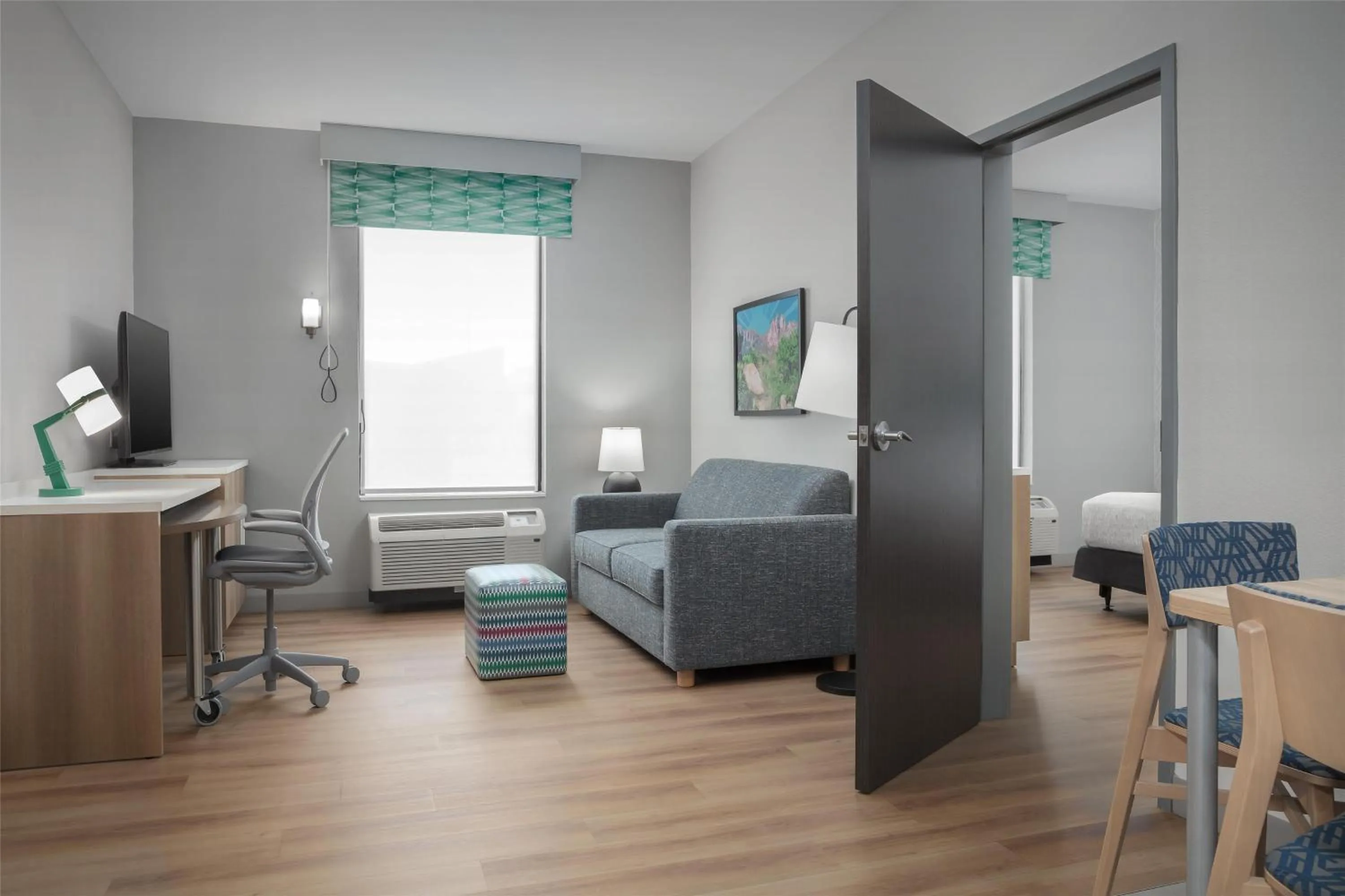 Living room, Bed in Home2 Suites By Hilton Las Cruces