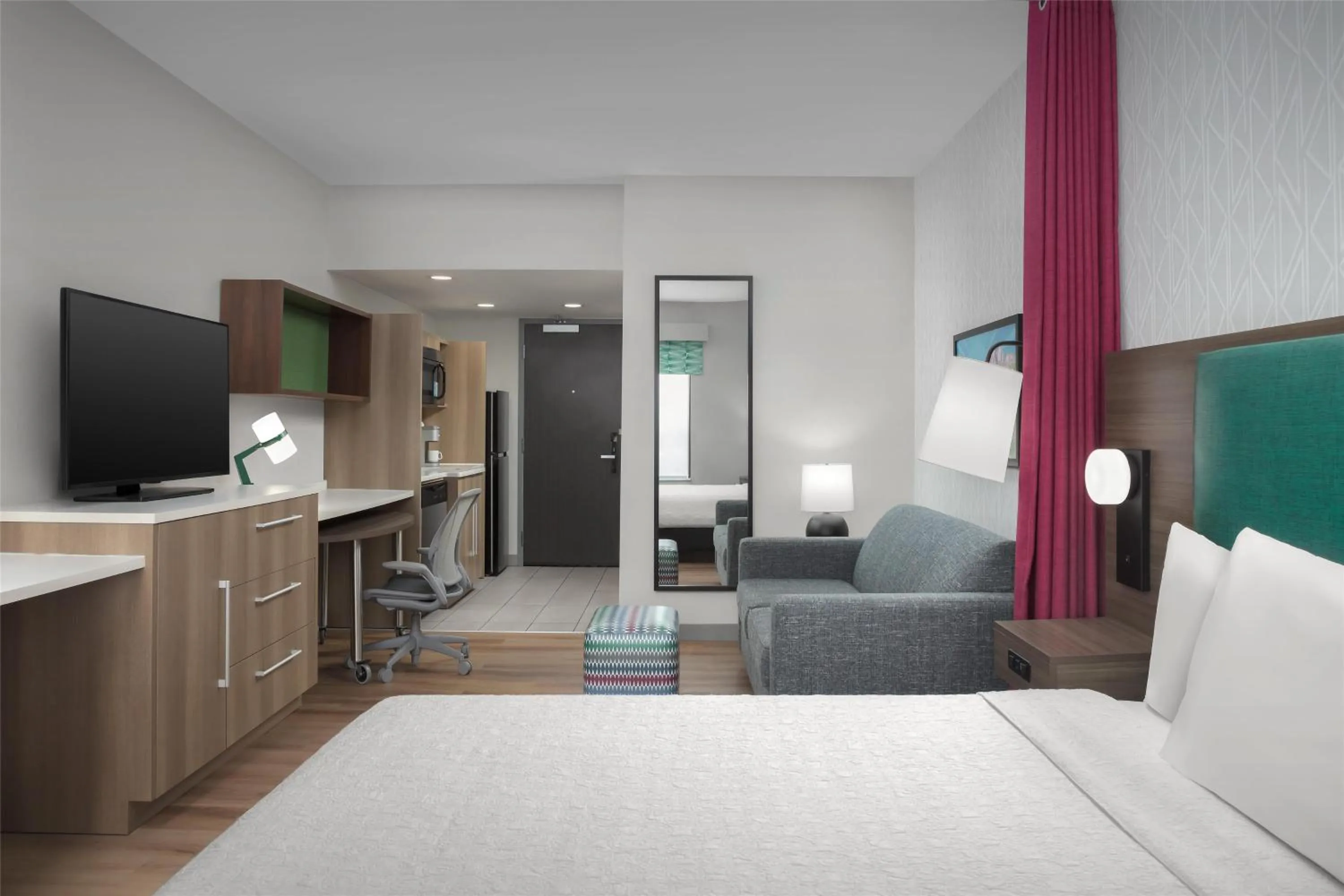 Living room, Bed in Home2 Suites By Hilton Las Cruces