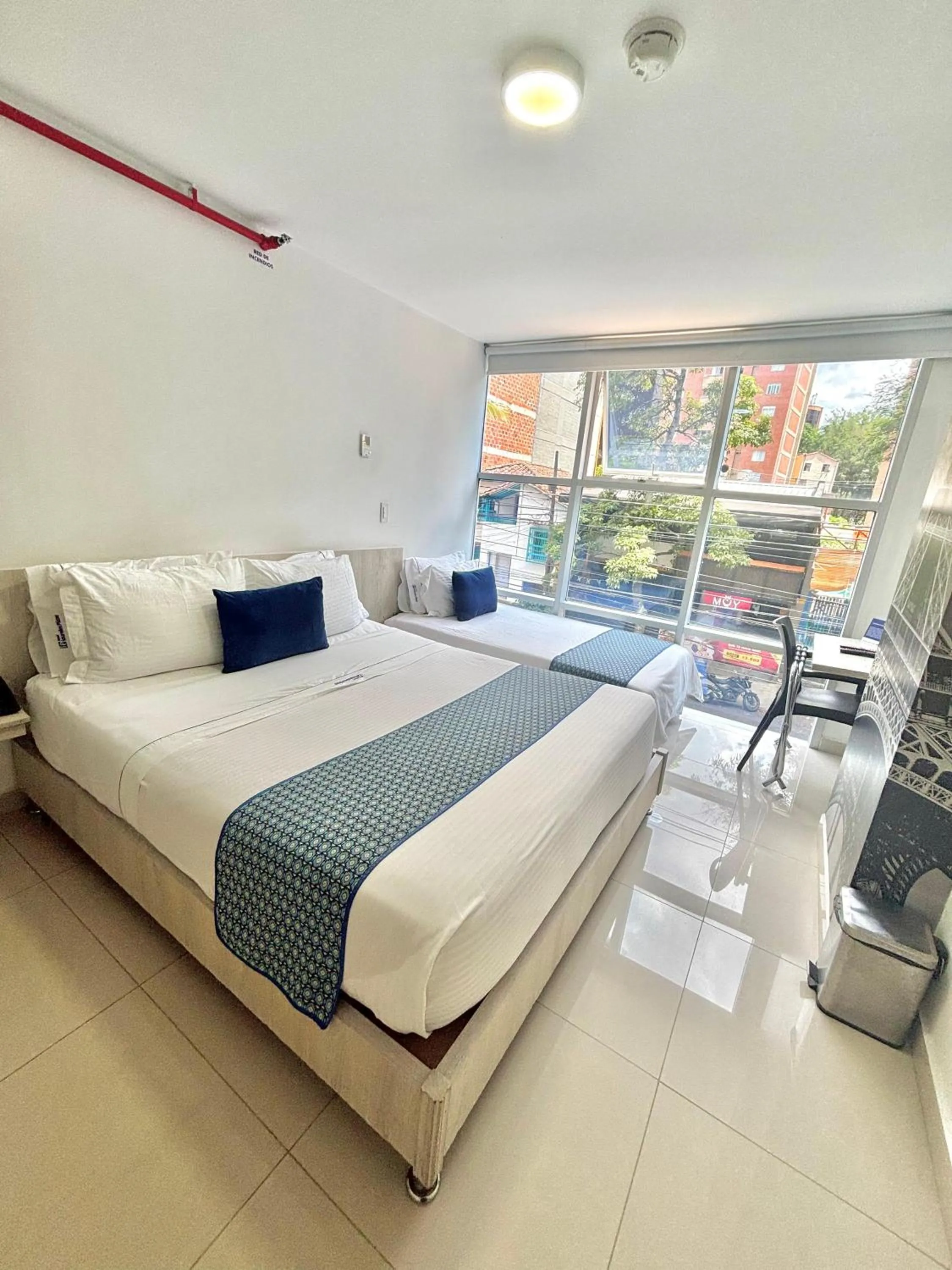 Bed in Hotel Laureles Plaza