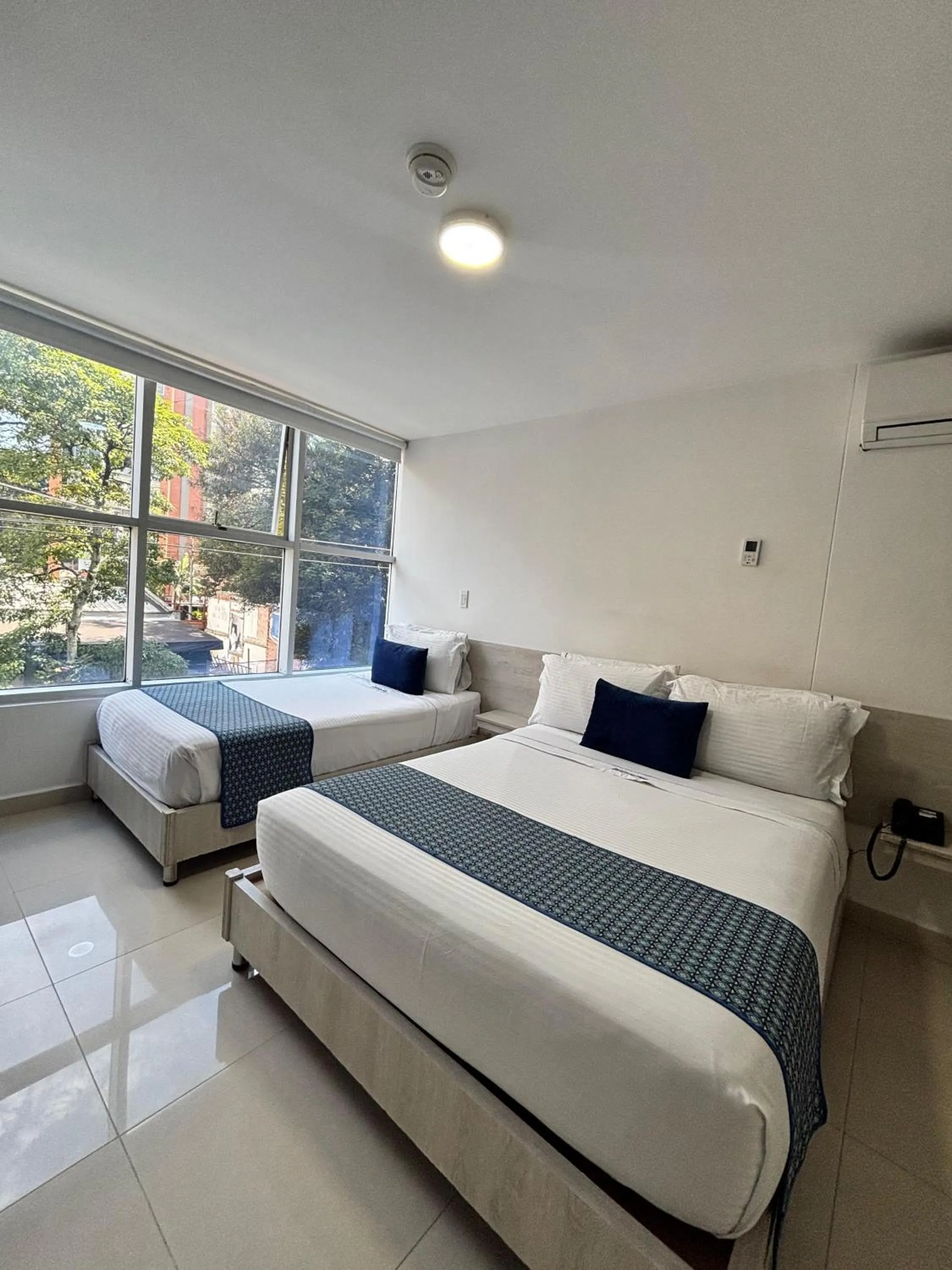 Bed in Hotel Laureles Plaza