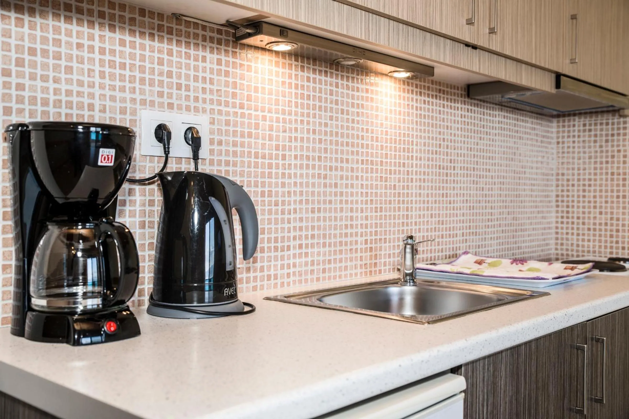 Kitchen or kitchenette in Minos Boutique Hotel