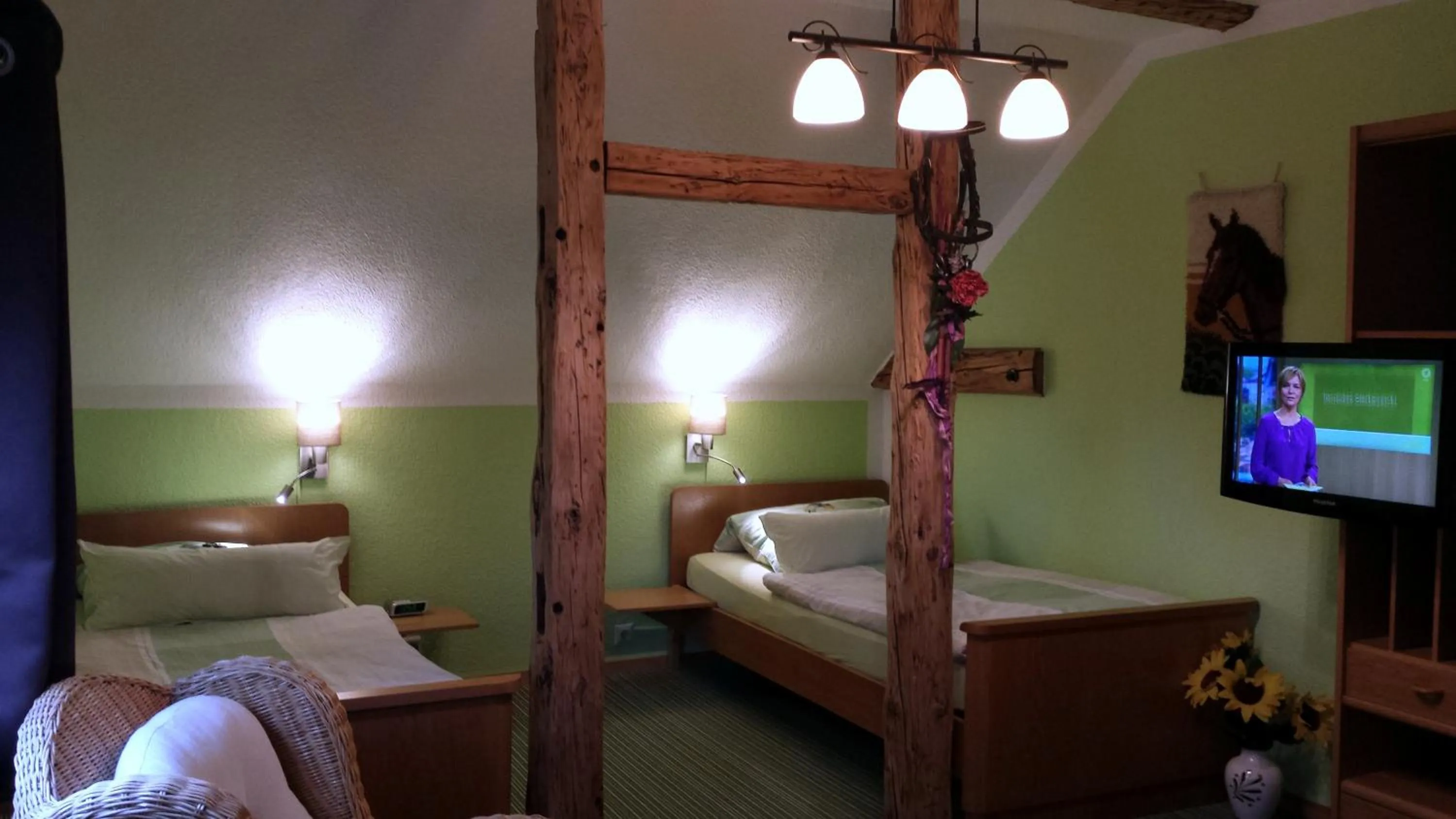 Photo of the whole room, Bed in Landhotel Sonnenhof im Wendland