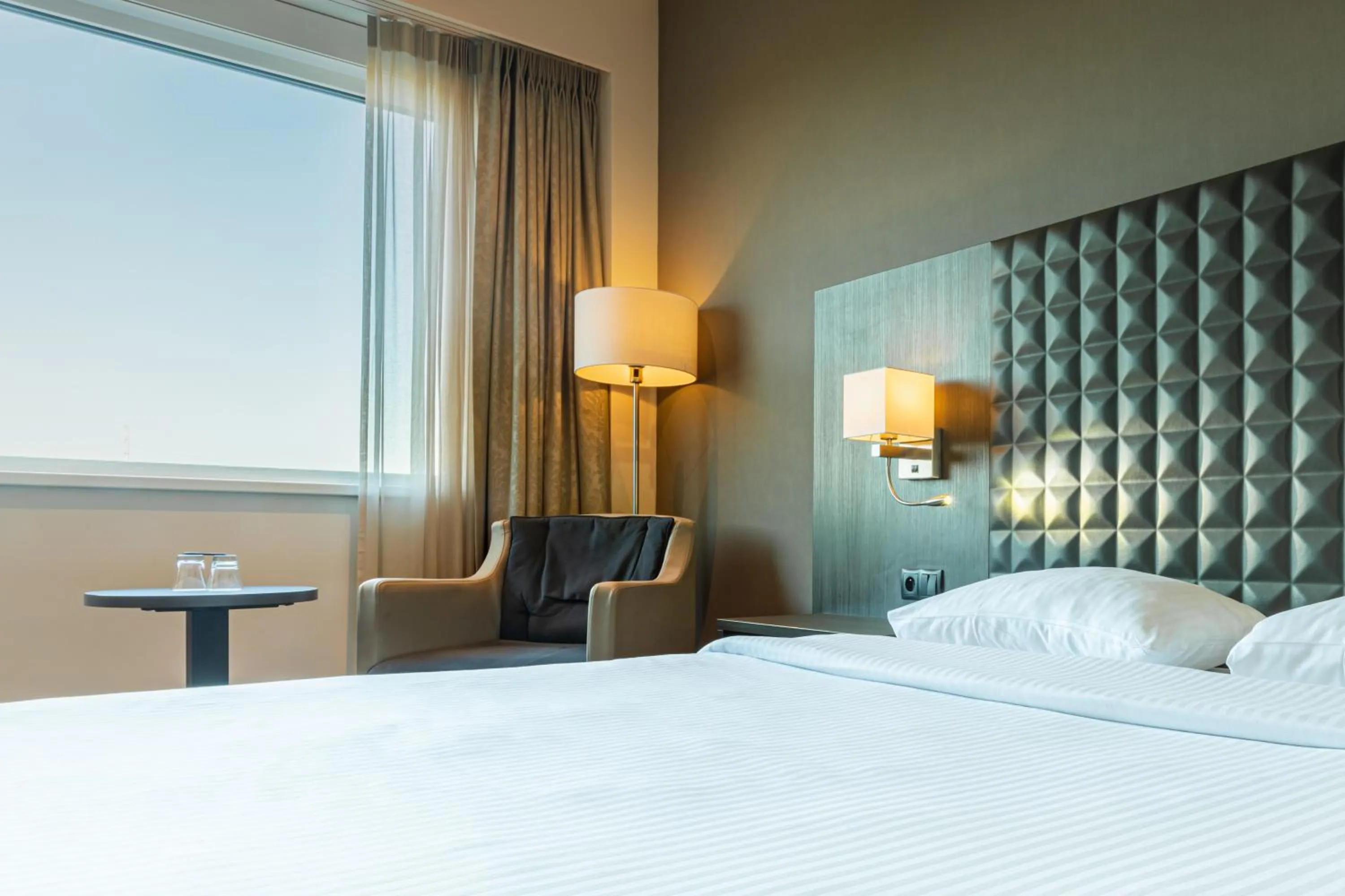 Bed in Mezzo Hotel & Business