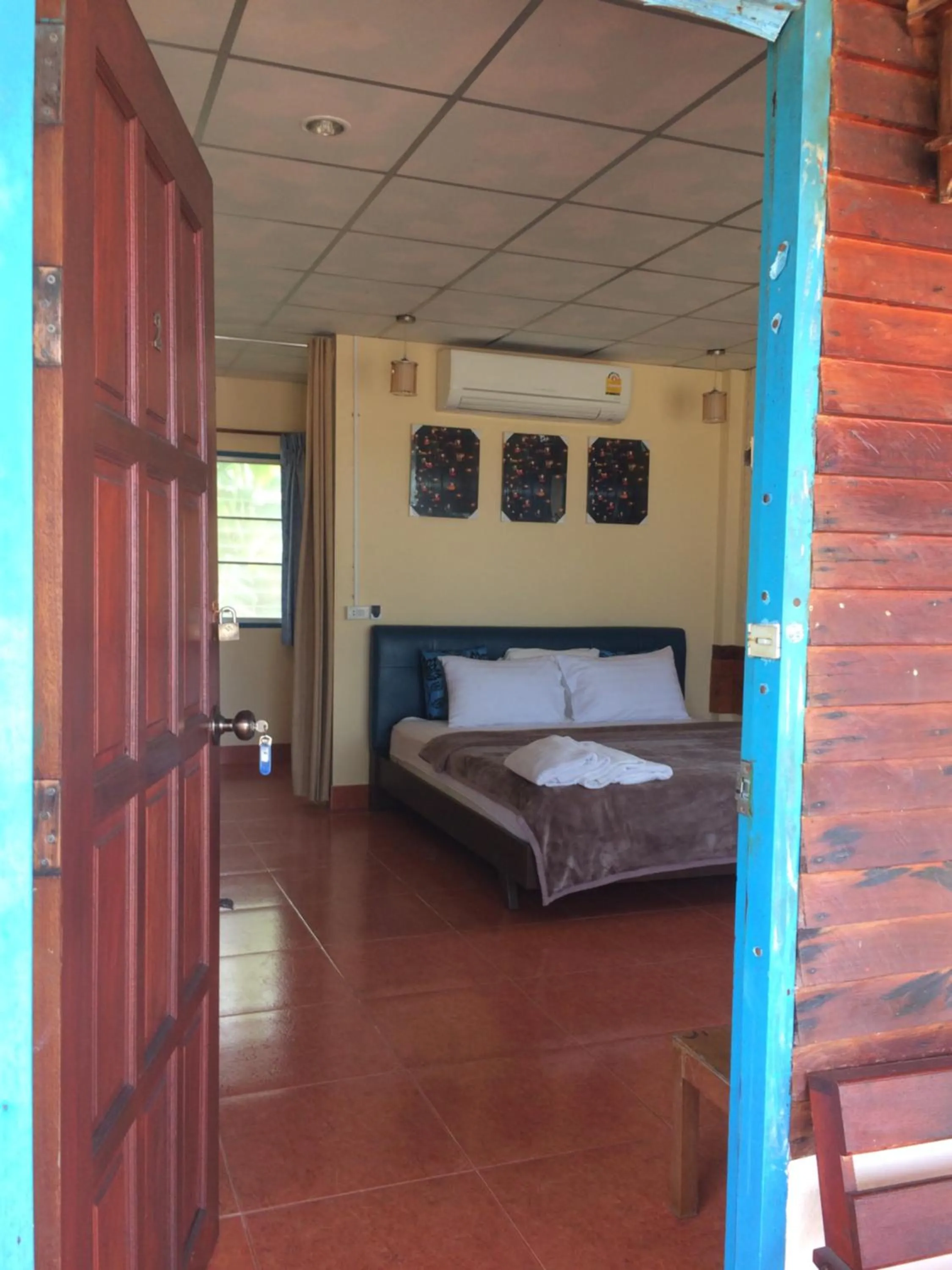 Bed in Tropicana Khophagan Resort Hotel