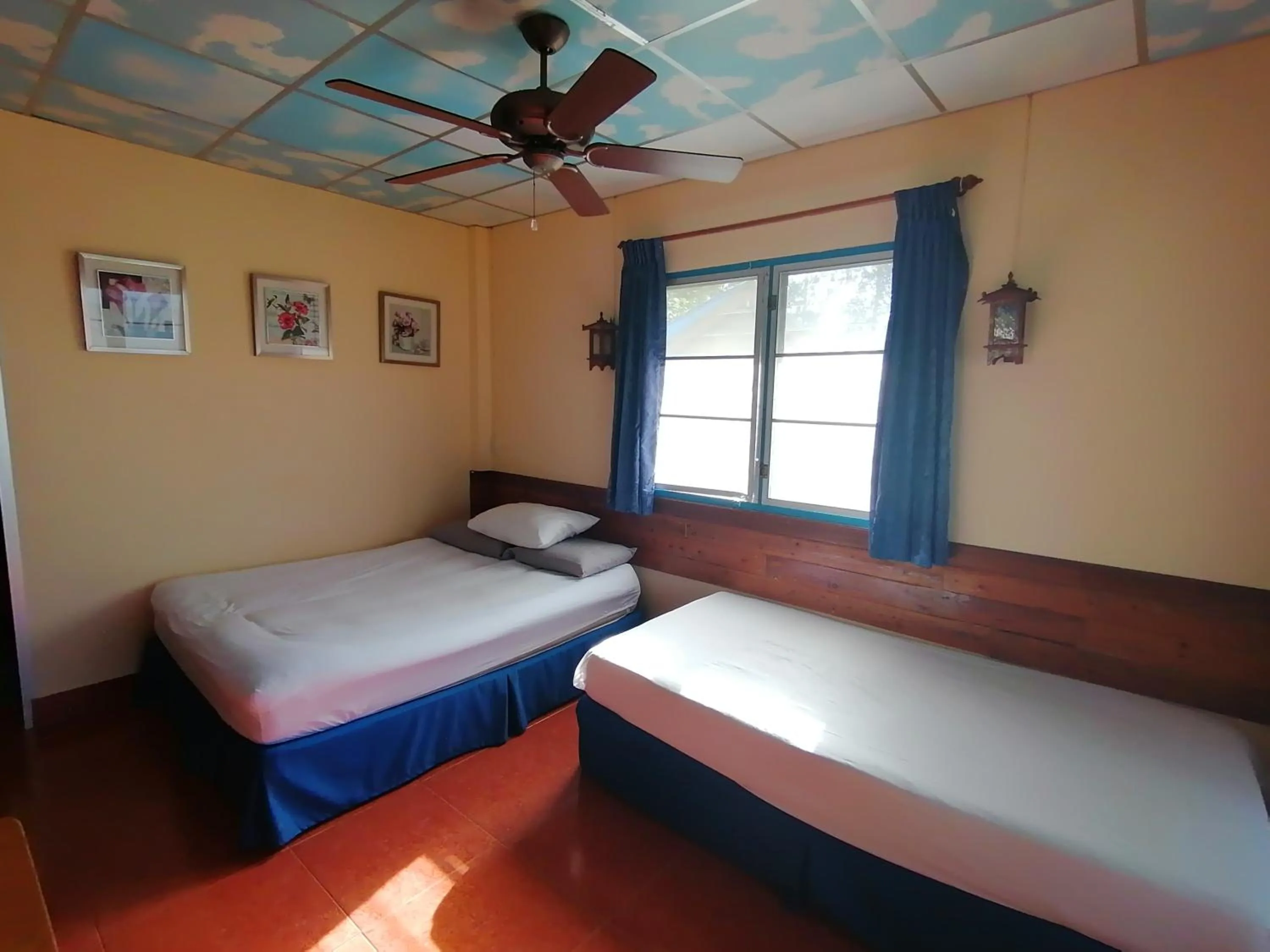 Bed in Tropicana Khophagan Resort Hotel