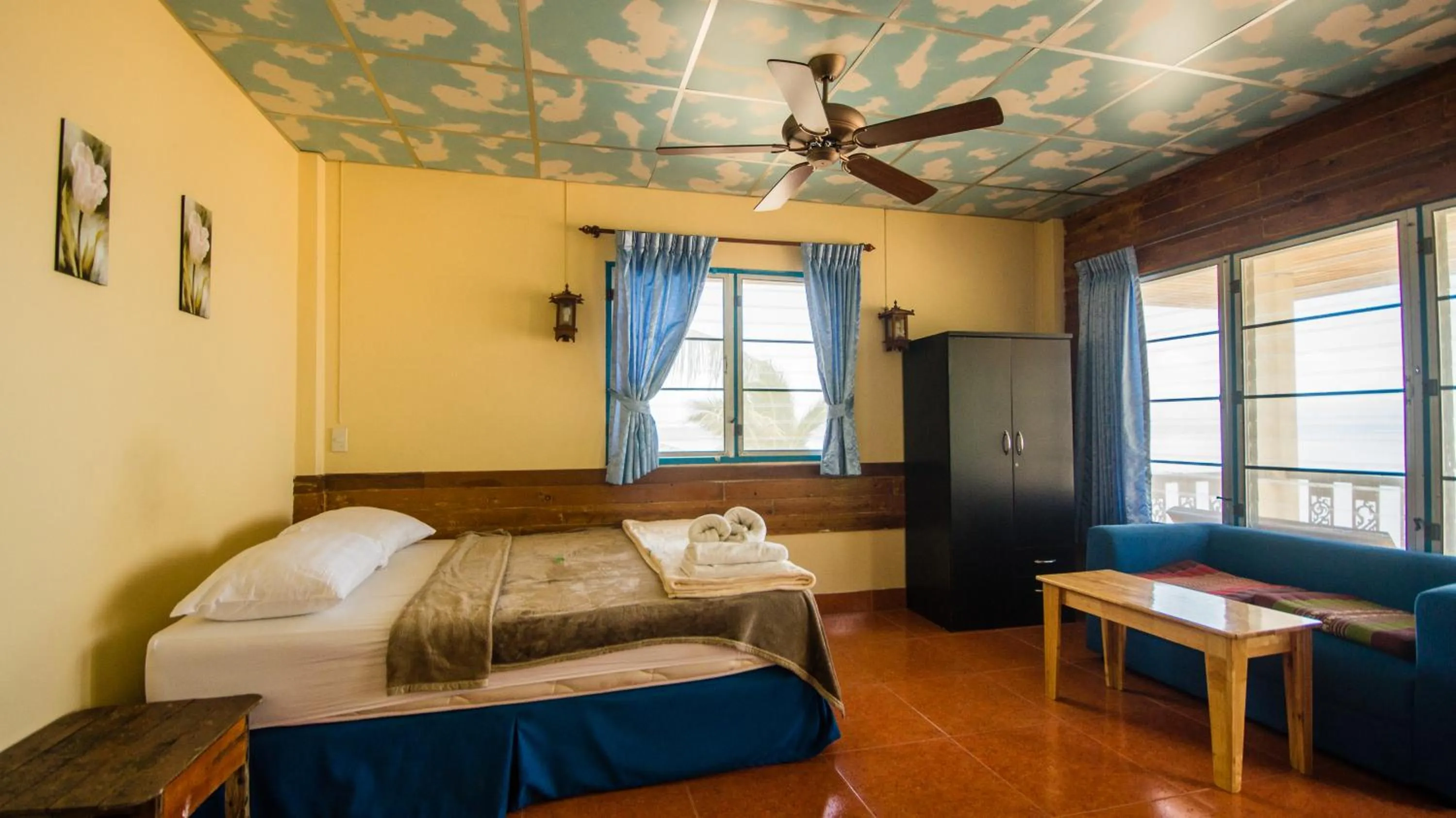 Bed in Tropicana Khophagan Resort Hotel