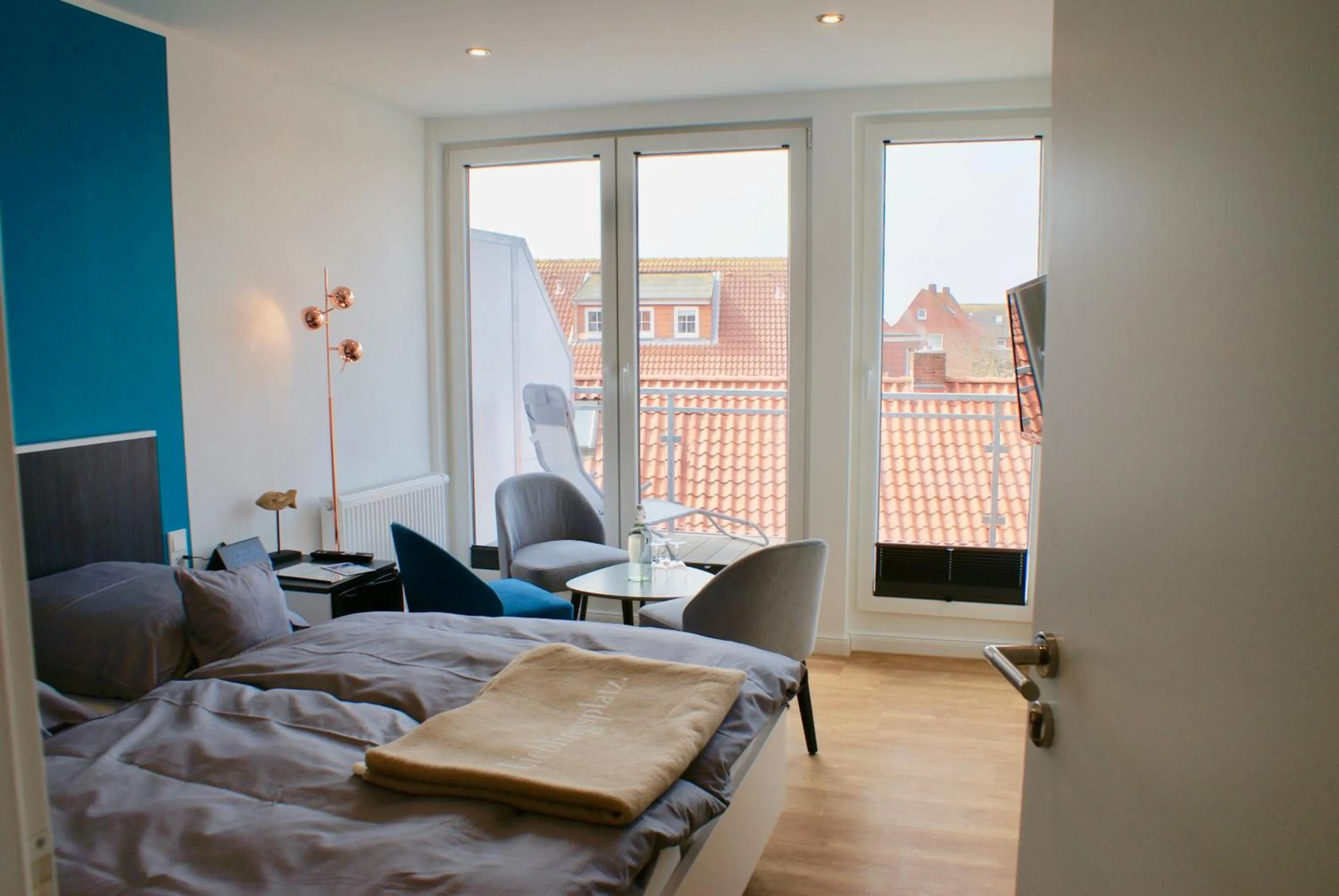 Photo of the whole room, Bed in Deichhotel Rose