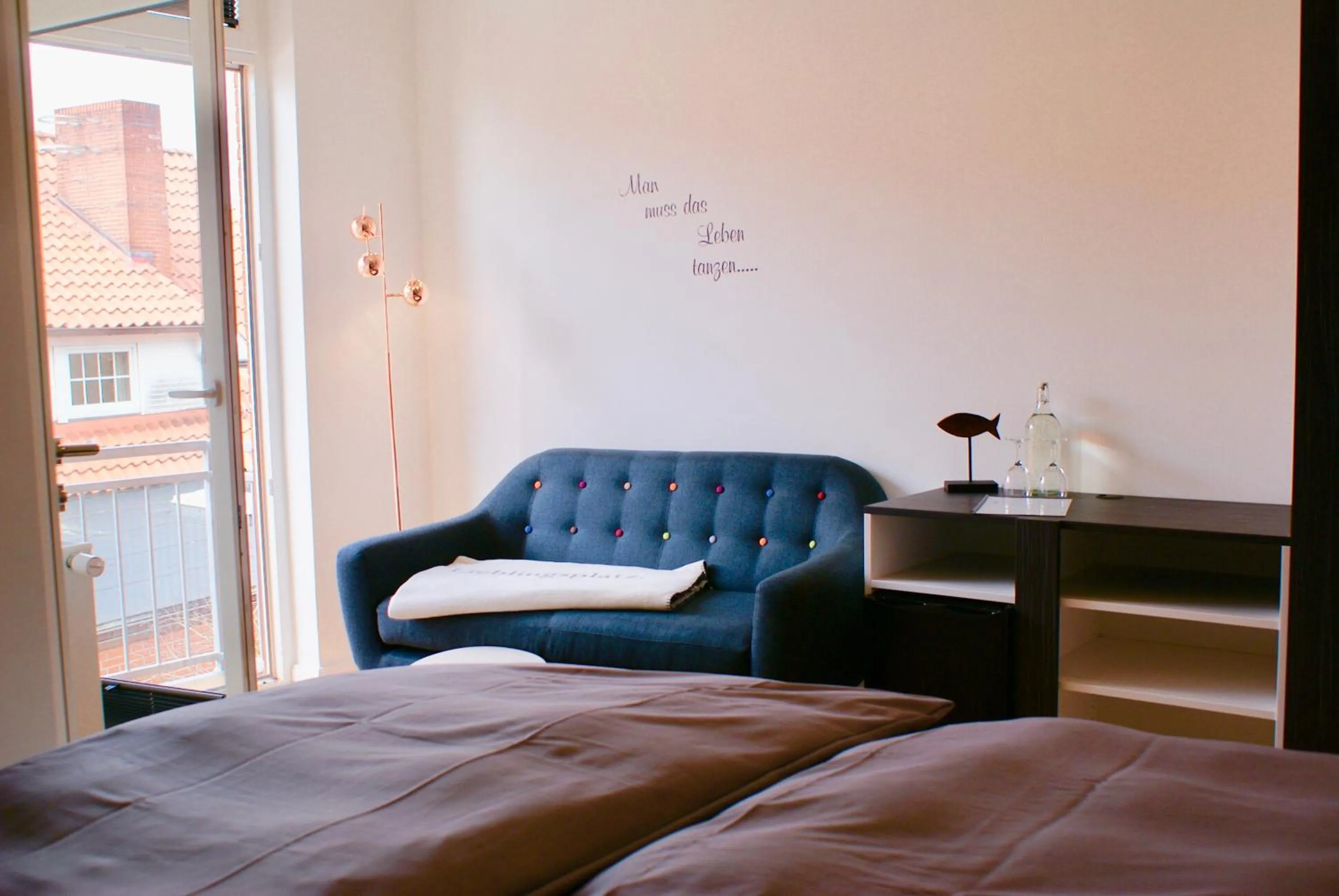 Photo of the whole room, Bed in Deichhotel Rose