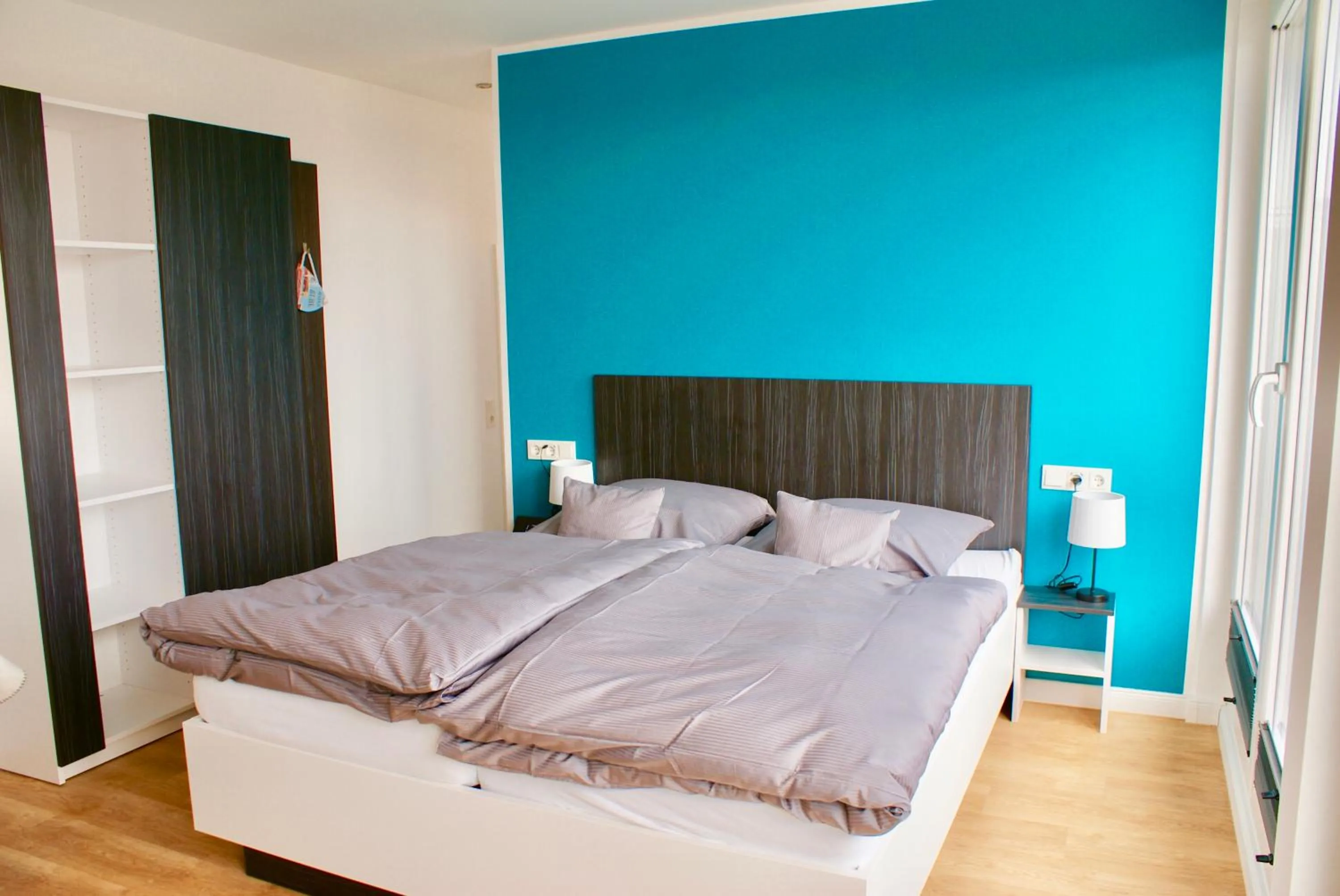 Photo of the whole room, Bed in Deichhotel Rose