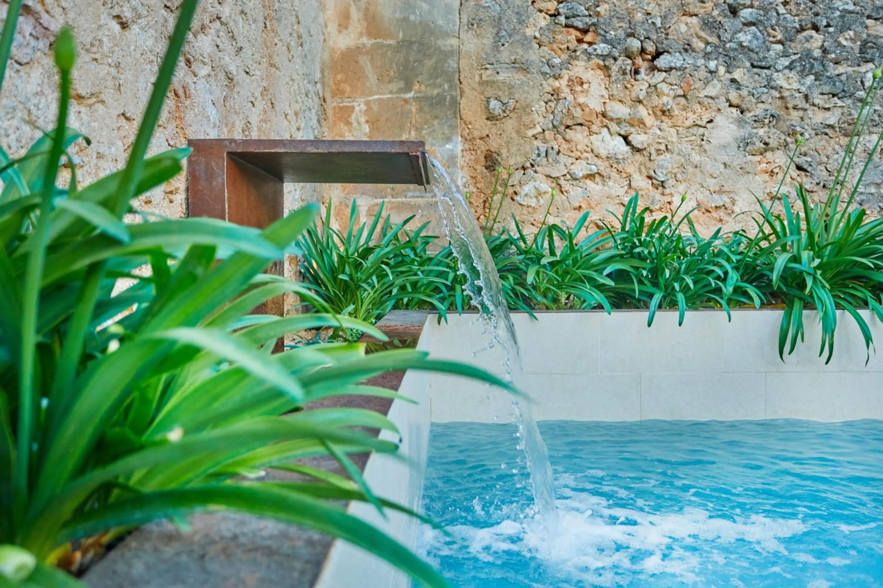 Swimming pool in Sa Creu Nova Petit Palais Art & Spa