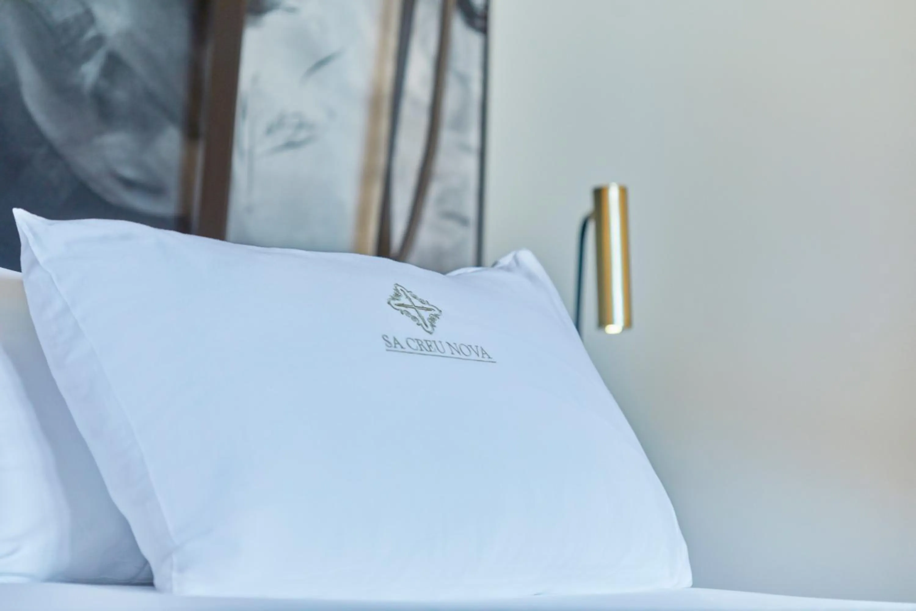 Decorative detail, Bed in Sa Creu Nova Petit Palais Art & Spa