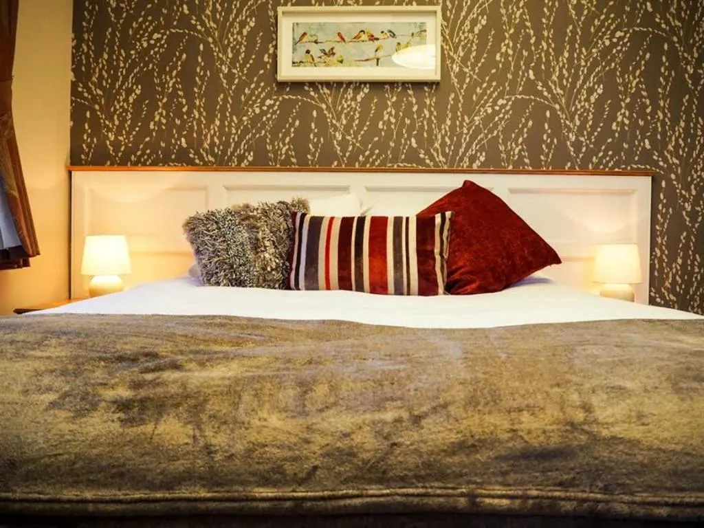 Bedroom, Bed in Parkwood Hotel