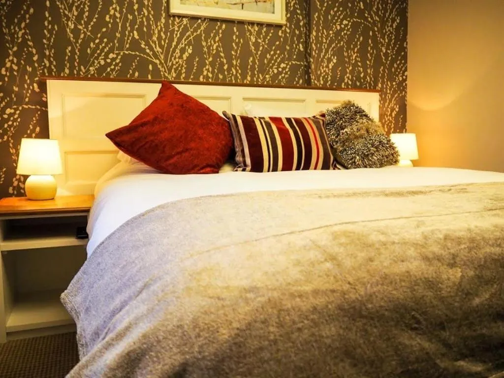 Bedroom, Bed in Parkwood Hotel