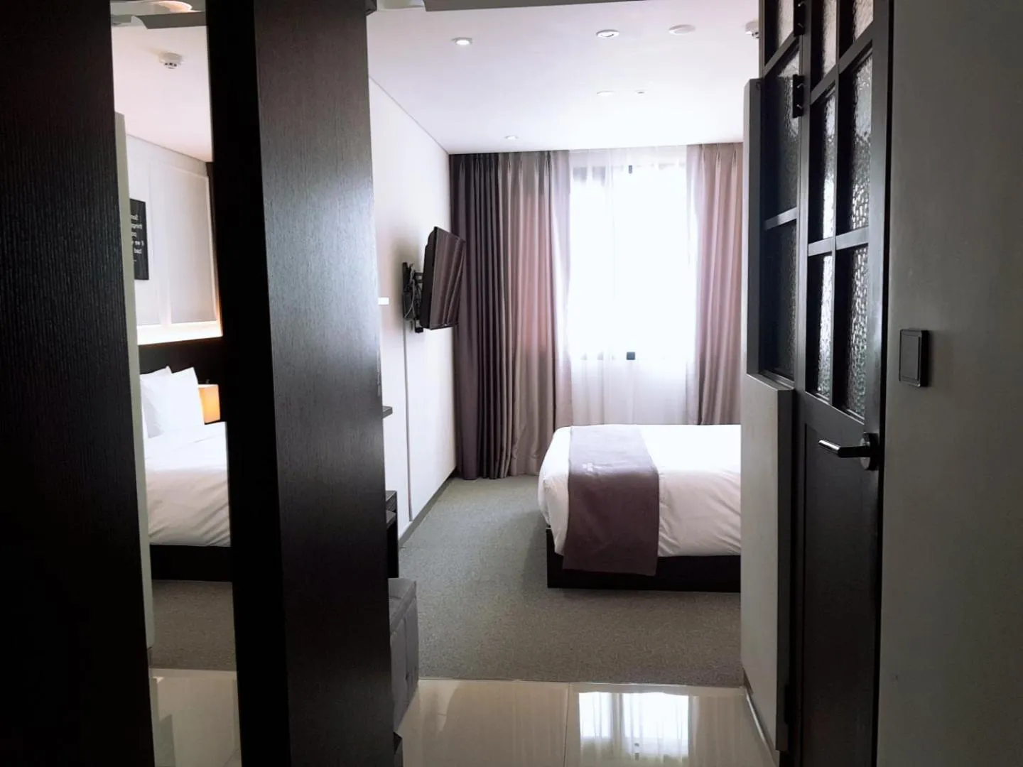 Bed in Vella Suite Hotel