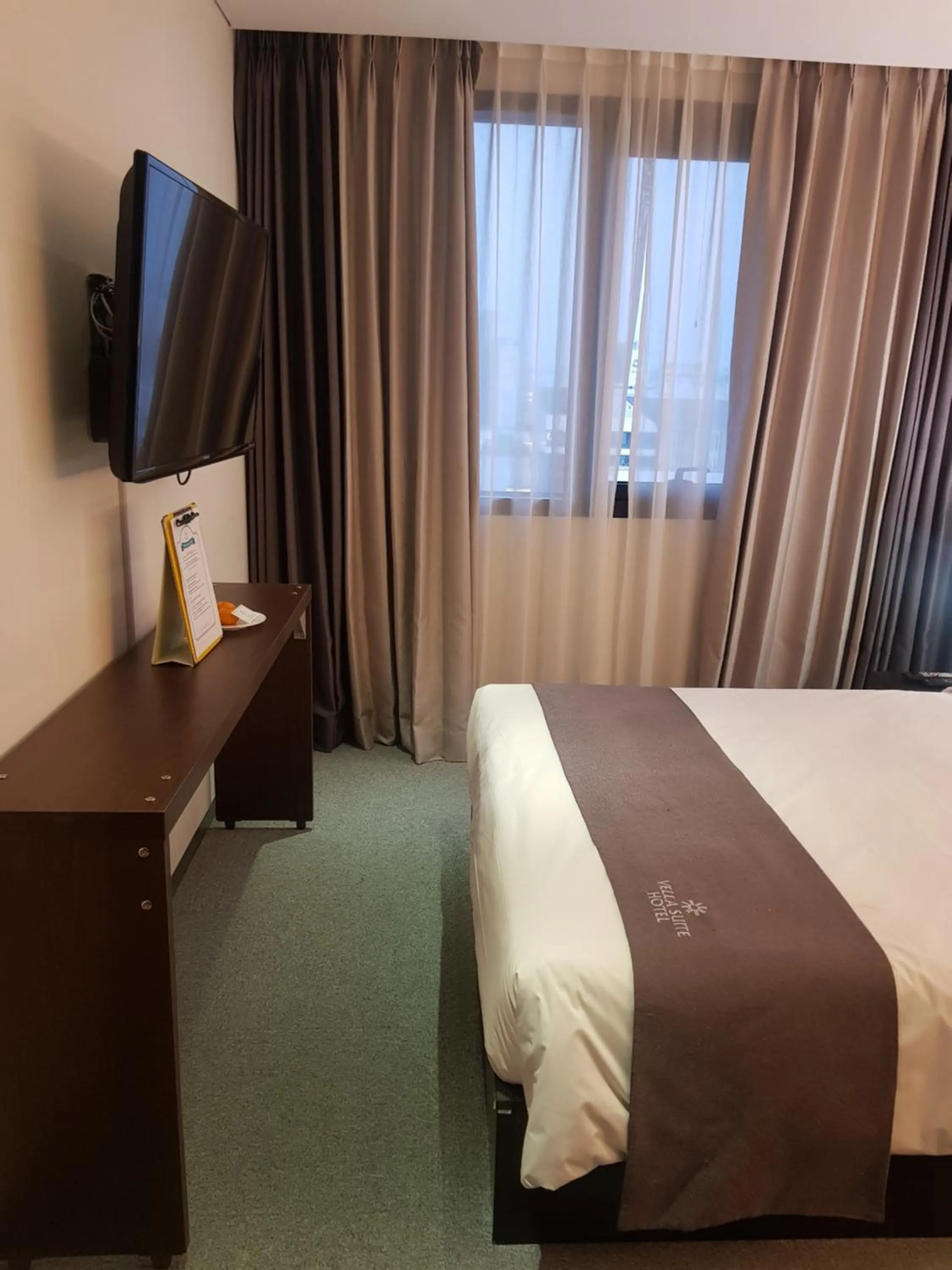 Bed in Vella Suite Hotel