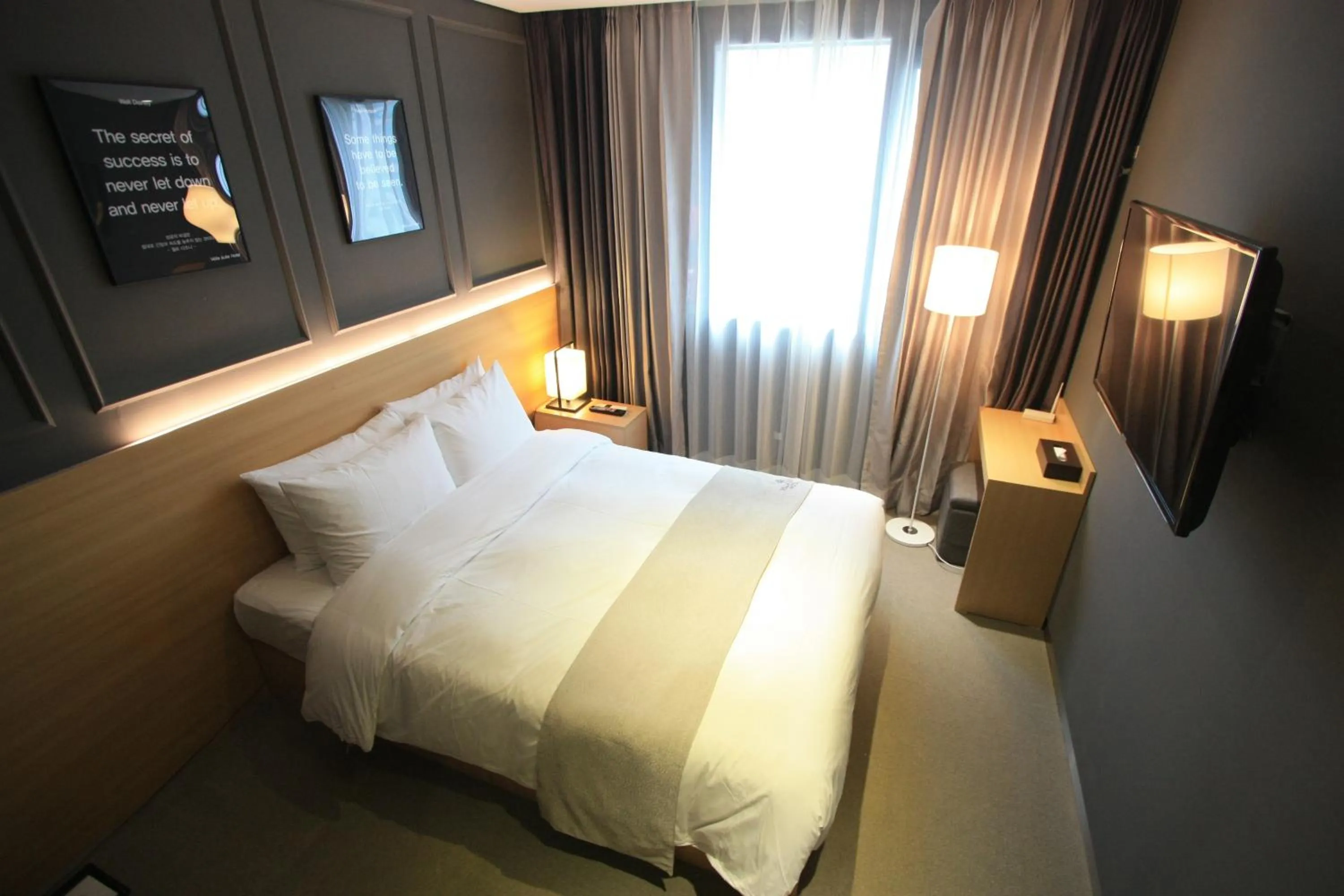 Bed in Vella Suite Hotel
