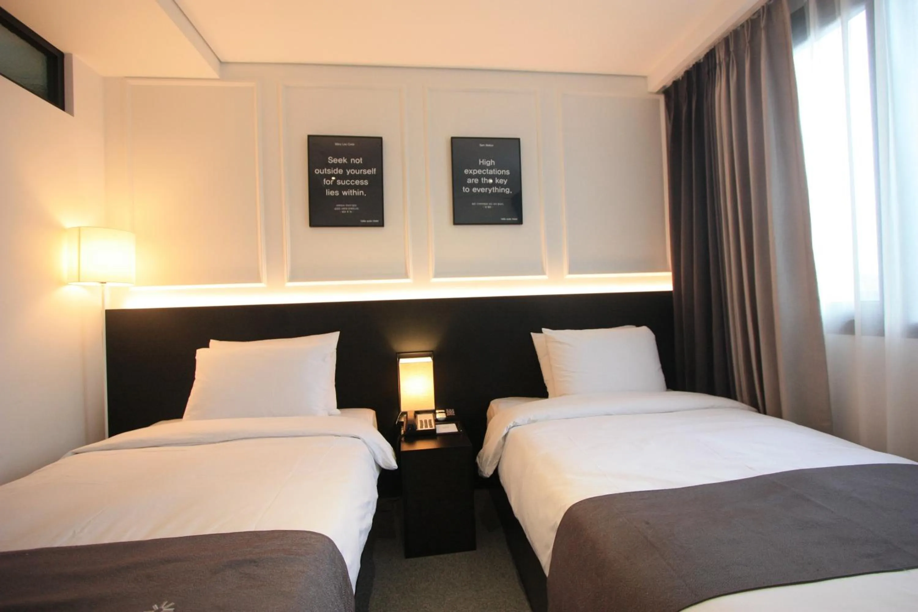 Bed in Vella Suite Hotel