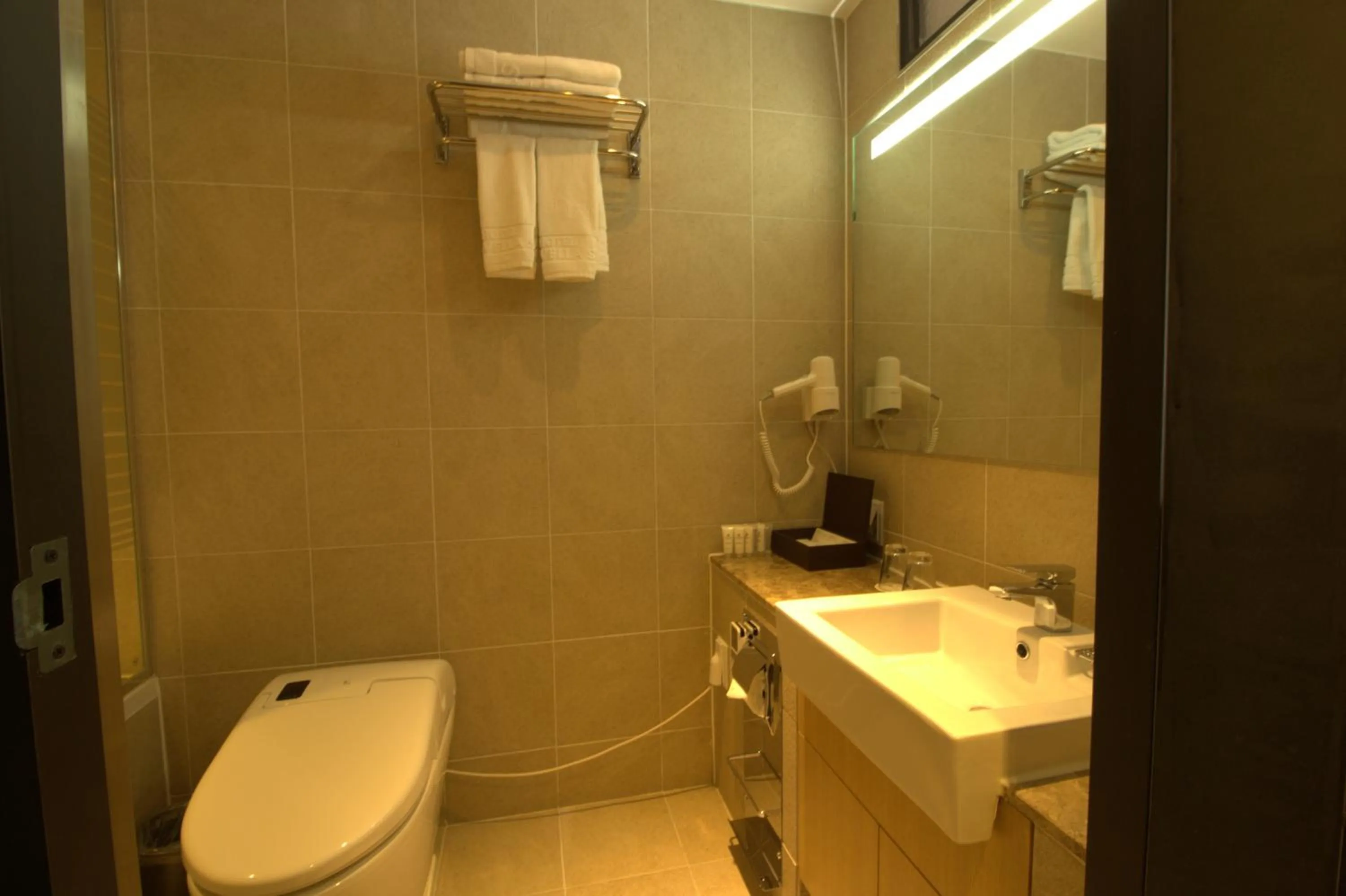 Bathroom in Vella Suite Hotel