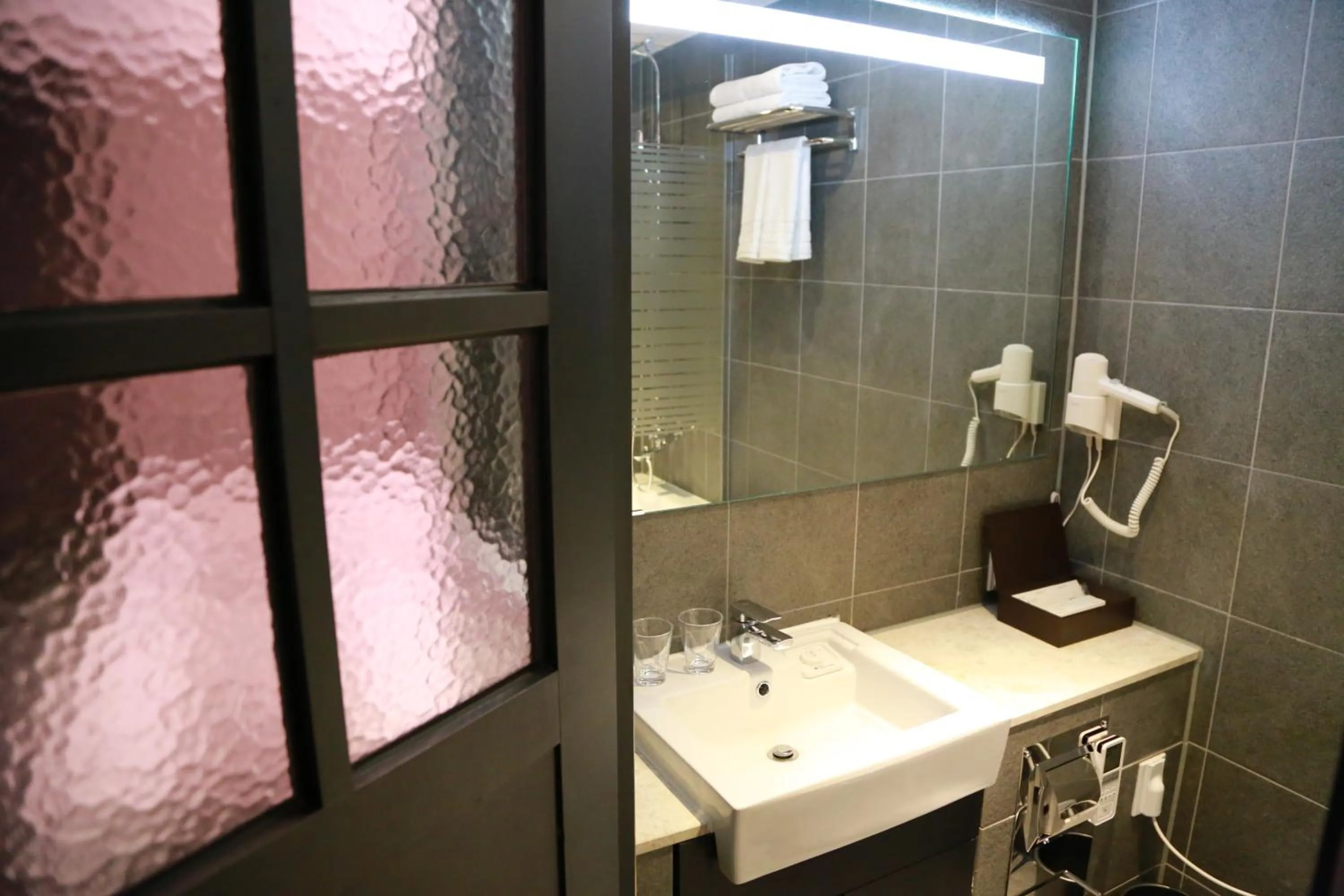 Bathroom in Vella Suite Hotel