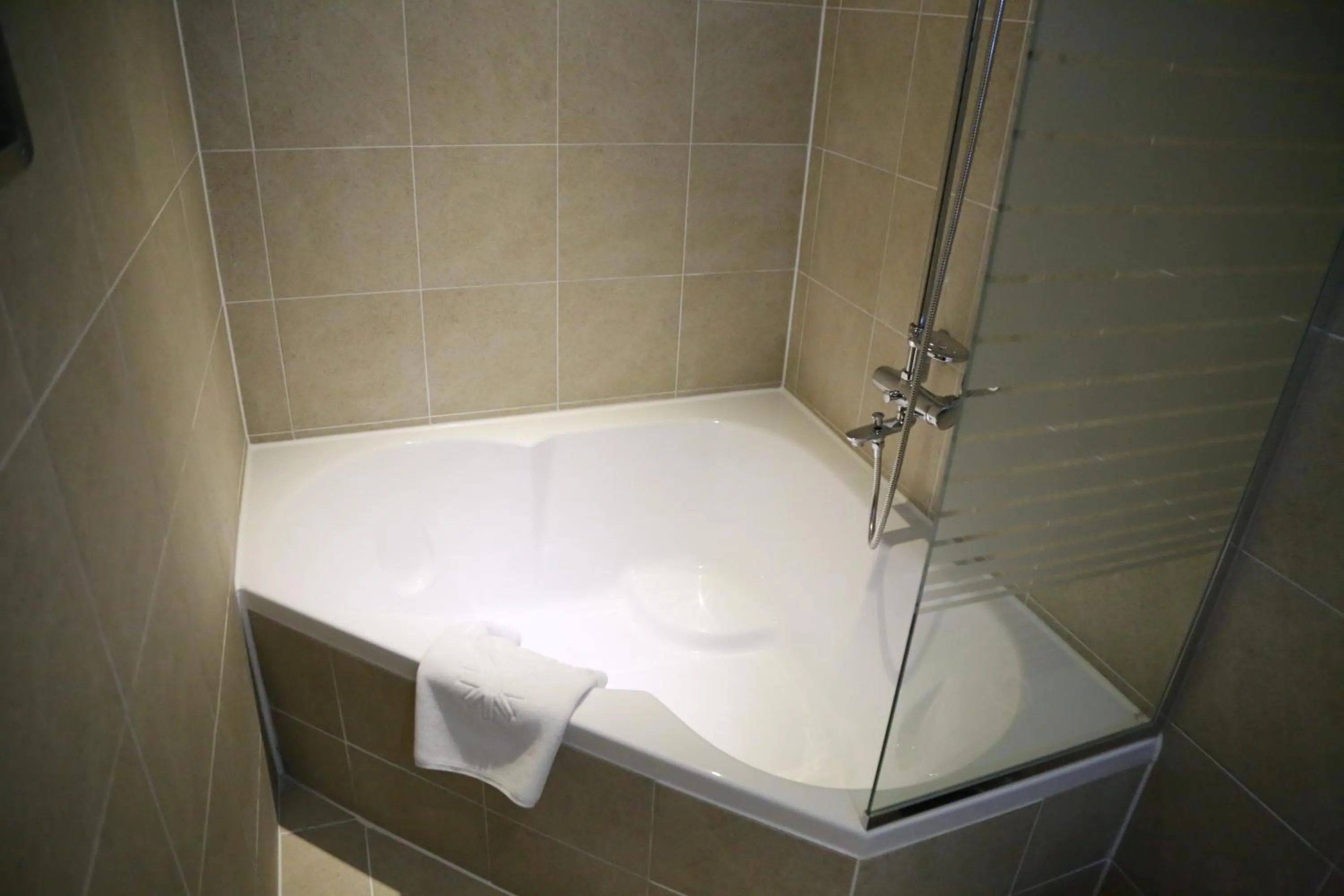 Bathroom in Vella Suite Hotel