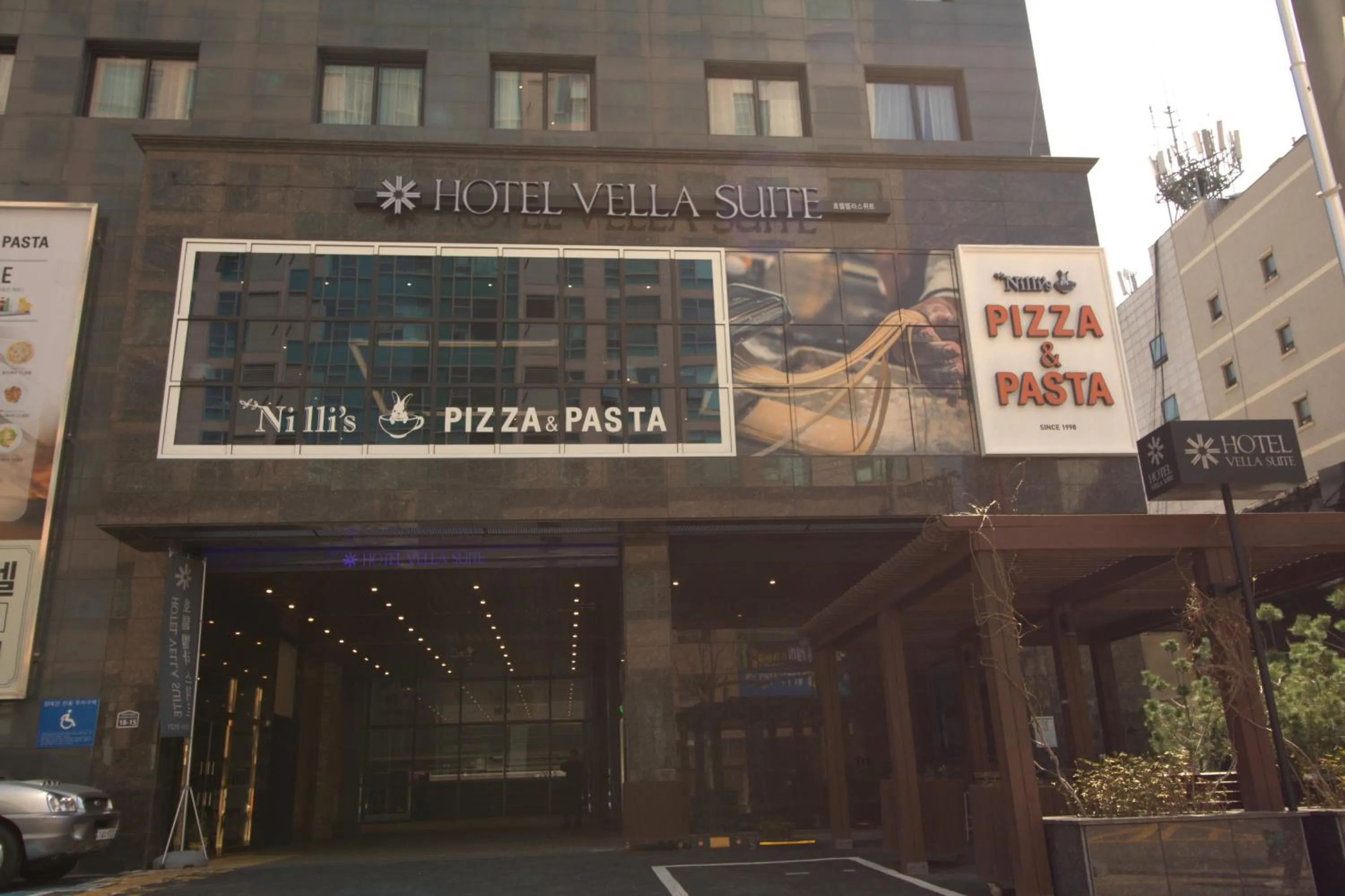 Facade/entrance in Vella Suite Hotel